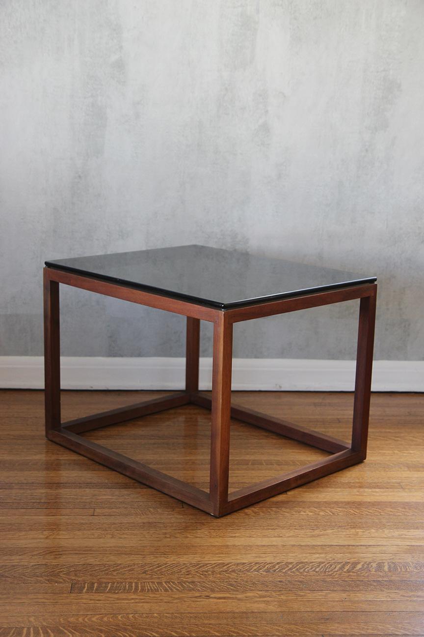 Made in Belgium in the manners of Kai Kristiansen. Solid teak wood and Smoked glass. Refinished. Gorgeous minimalist design offering a sleek and elegant profile. Simple and organic form. Would fit well in a Mid-Century Modern, minimalist, natural,