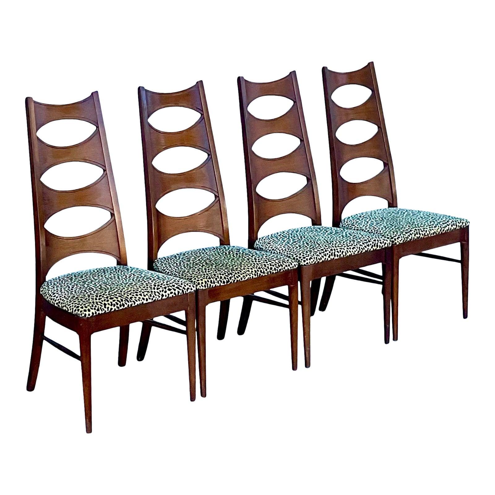 A fantastic set of 4 Kent Coffey dining chairs. Part of the iconic Perspecta collection. The chairs are the coveted “Cats Eye” design. Leopard upholstery for a little extra sexy. A real collectors set. Unmarked. Acquired from a Palm Beach estate.