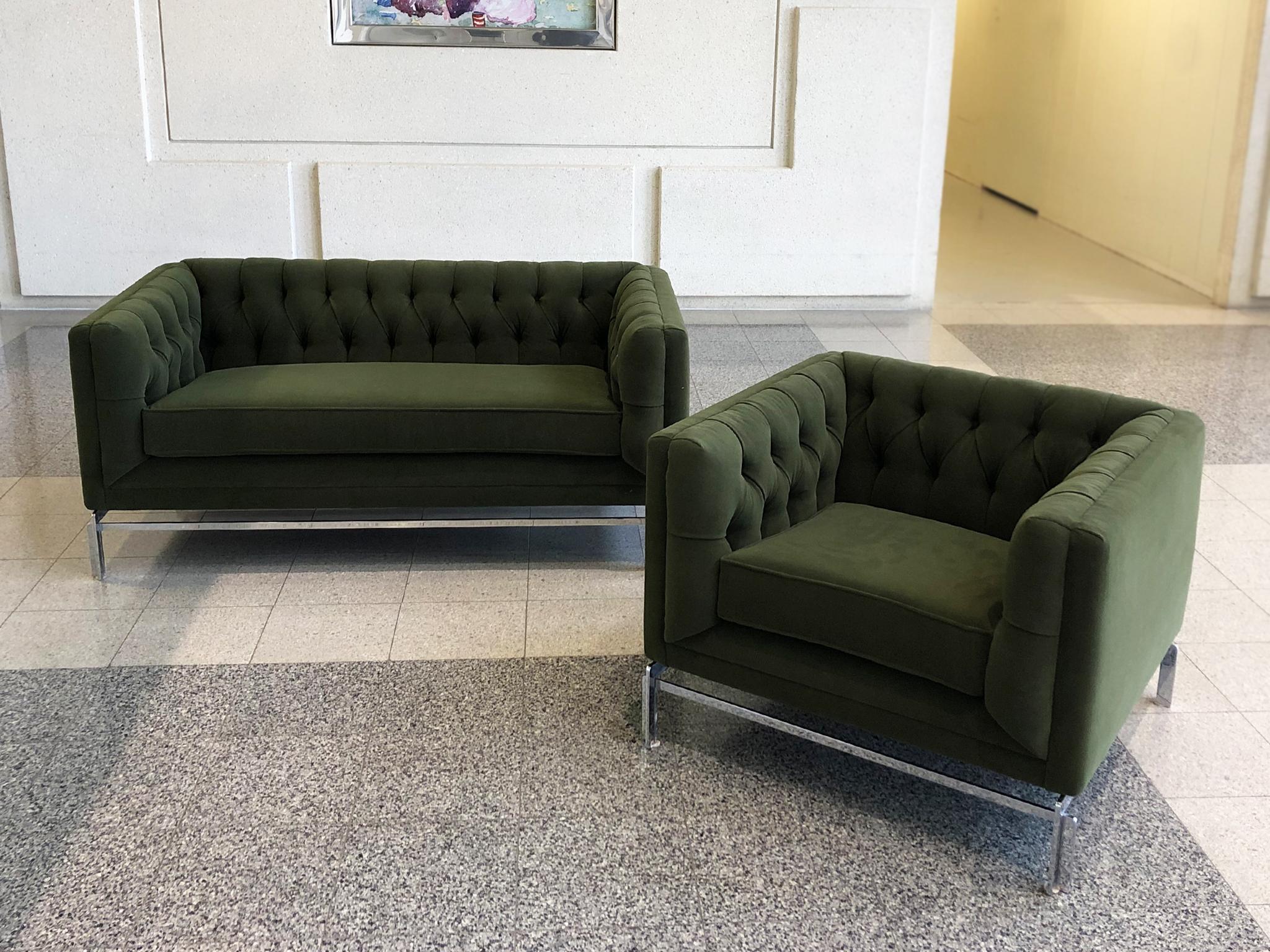 An exquisite set of newly reupholstered settee and club chair attributed to Stow & Davis. This pair is in the manner of Knoll. They are a modern take on the classic Chesterfield. Button-tufted back and arm cushions are set in an elegant, slickly