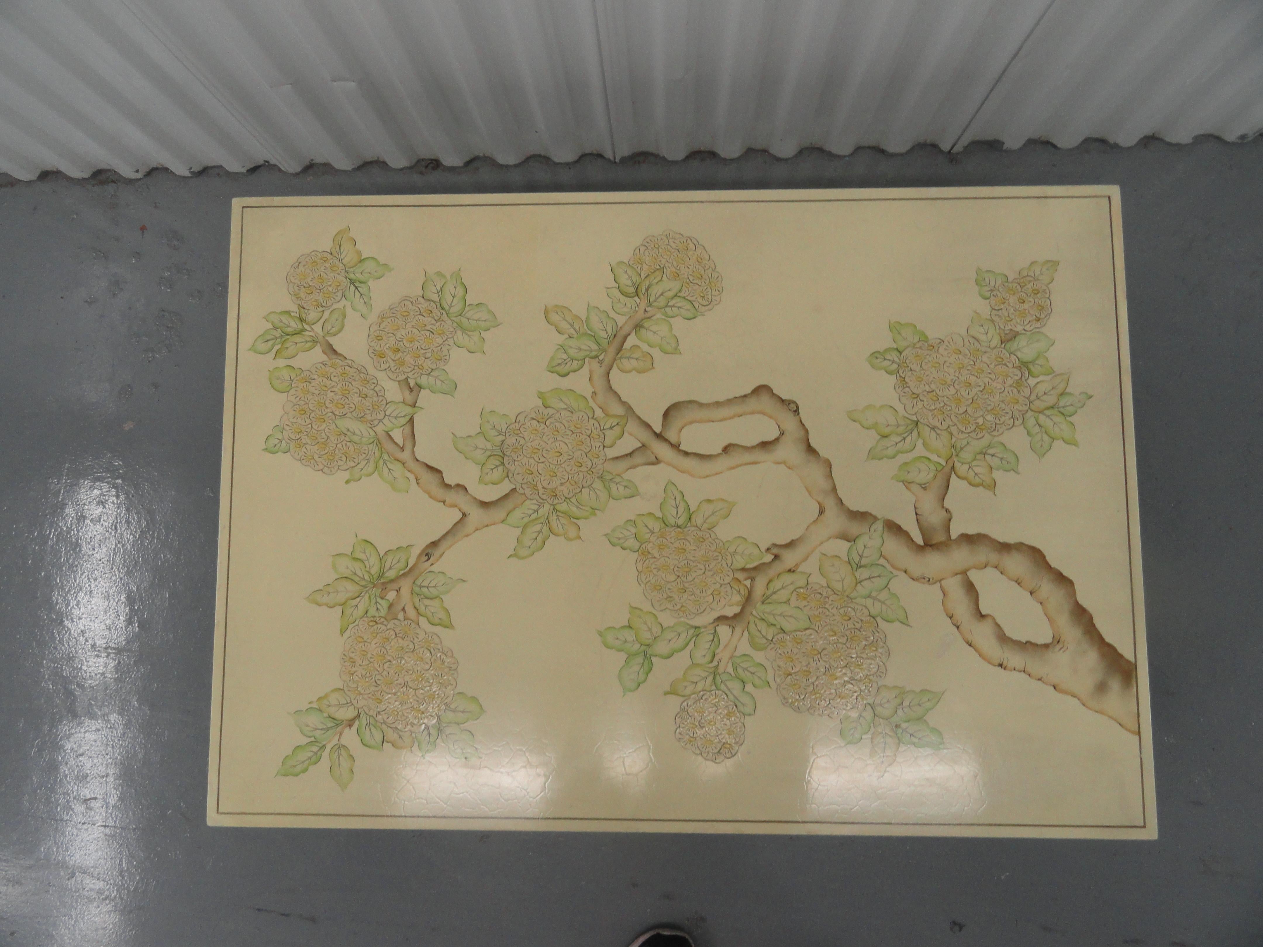 Midcentury chinoiserie style lacquered coffee table with classic peony bloom motif.