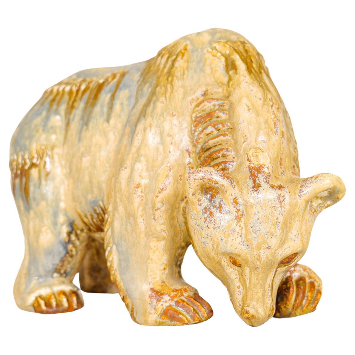 This large and heavy ceramic bear was made in Sweden during the 1950s at Rörstrand and designed by famous Gunnar Nylund. Together with the fanatics pattern and the stunning glaze this version 31/300 is a great edition to any home. 

Dimensions: