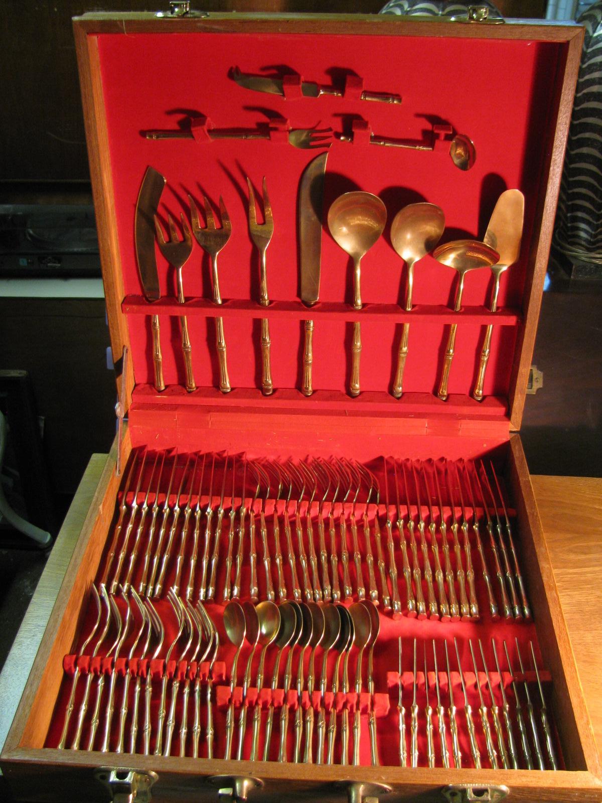Fabulous set of faux bamboo cutlery service for twelve. Boxed set has a total of 144 pieces including serving knives, spoons and forks. Metal is hand casting of solid stainless nickel bronze, which is safe and if kept in its box when not in use will