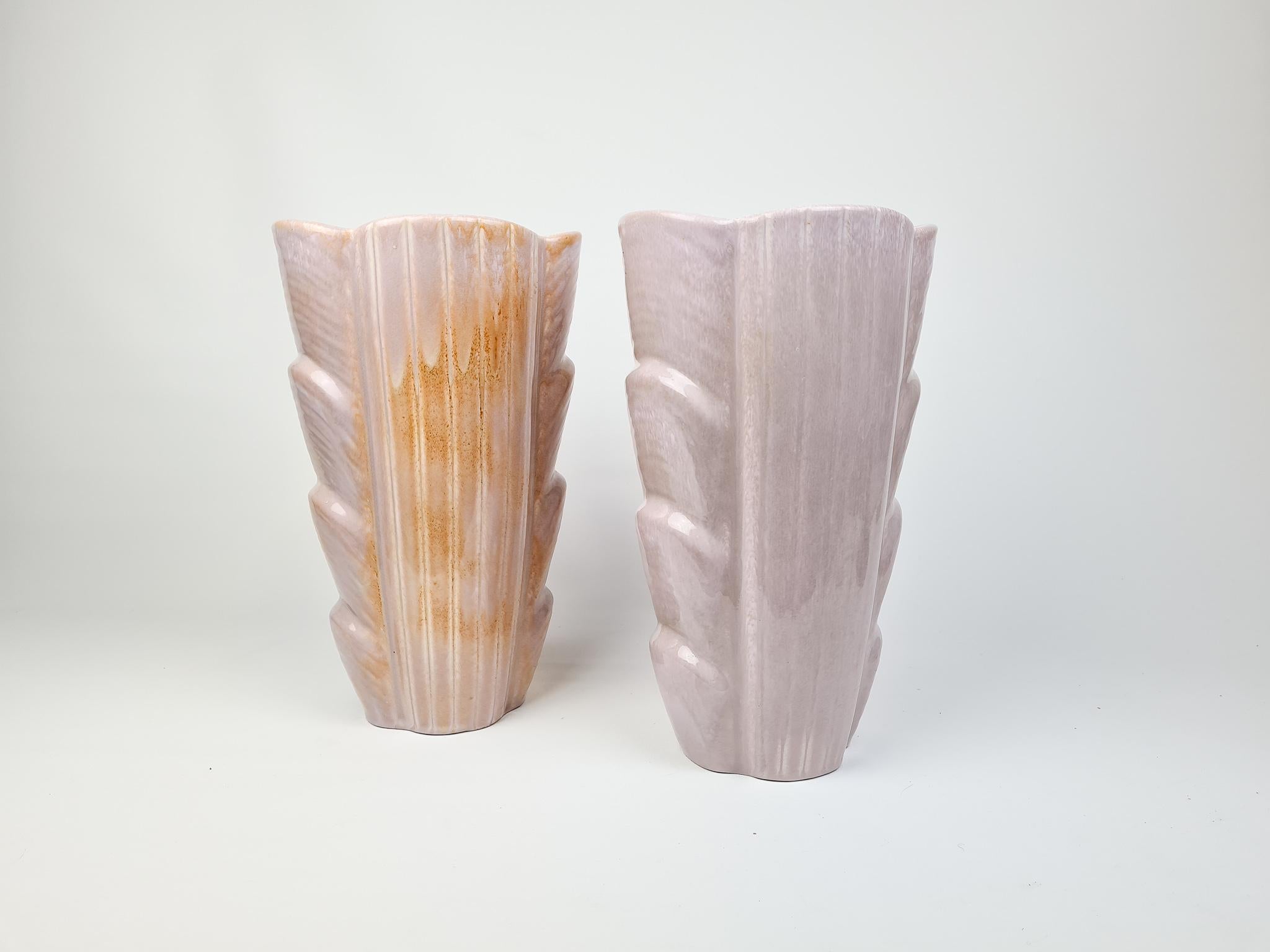 Exceptional quality over these vases produced in Sweden at Rörstrand factory and designed by Gunnar Nylund. It was made in 1950s and has a nice shimmer glaze with fine lines.

Particularly good condition.

Measures: H 30 cm, W 18 cm, D 14 cm.
