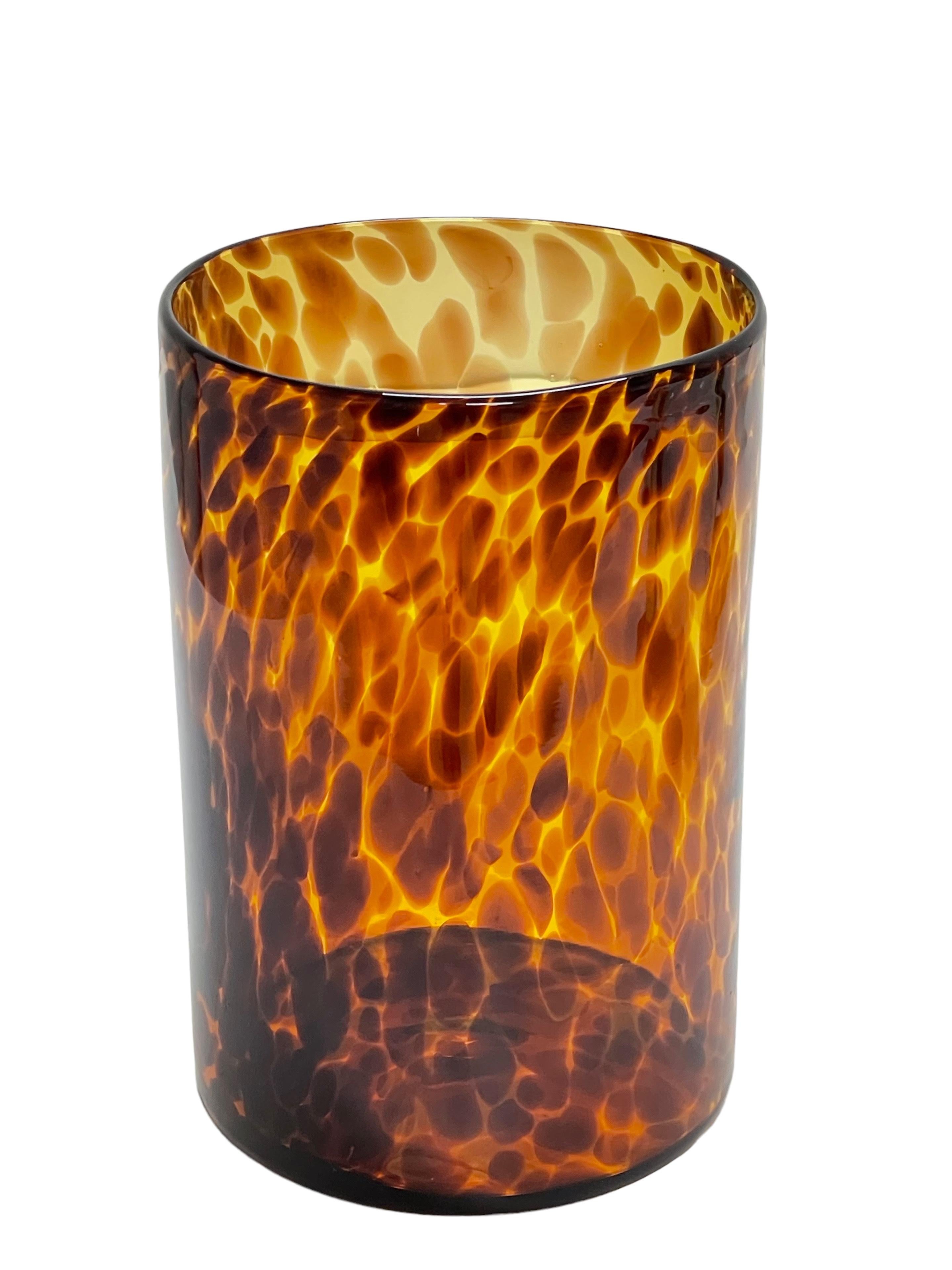Amazing midcentury large orange and brown leopard glass artistic vase. This incredible piece was designed in Italy during the 1980s.

This item is amazing as it has a wonderful pattern, recalling the classing and evergreen leopard skin. The