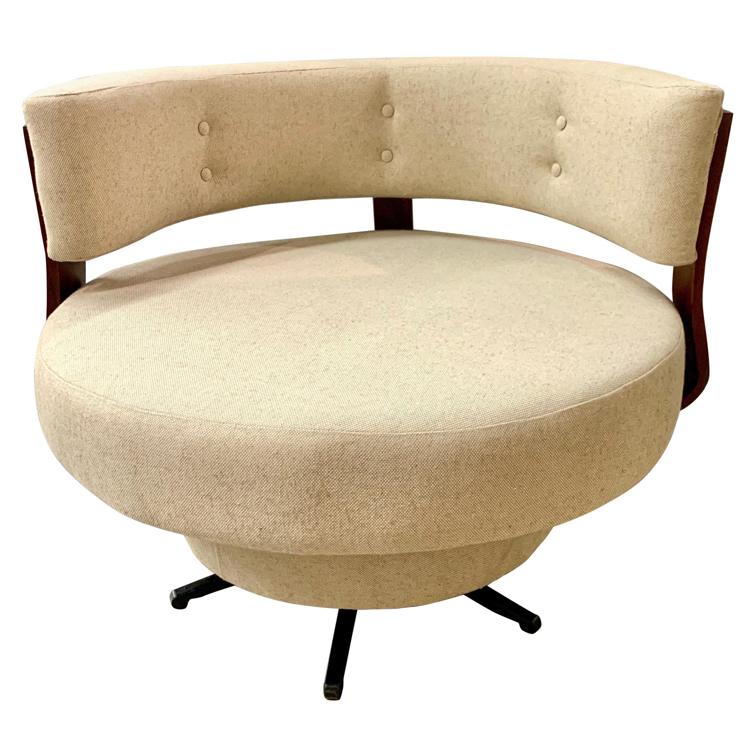 Midcentury Large Round Swivel Chair Newly Upholstered in an Oatmeal Fabric