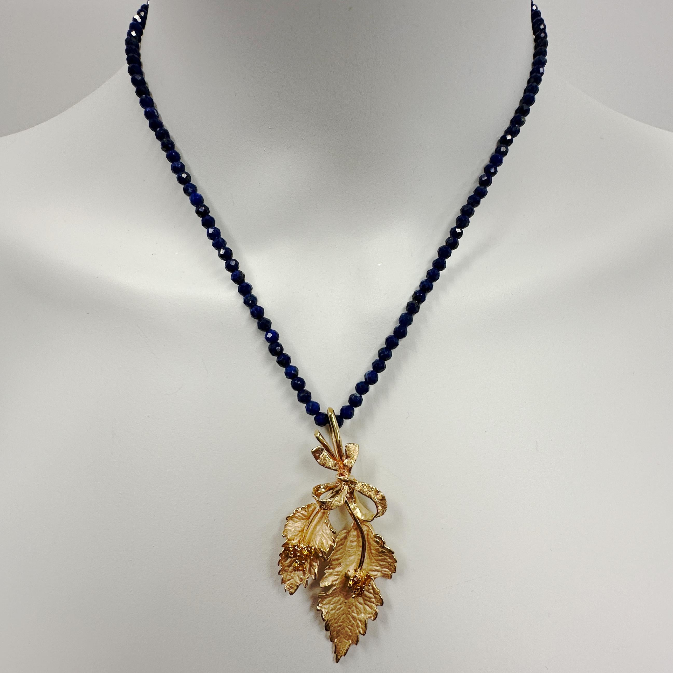 Contemporary Mid-Century Leafy Sprig Pendant with Citrines in Yellow Gold on Lapis Bead Chain For Sale
