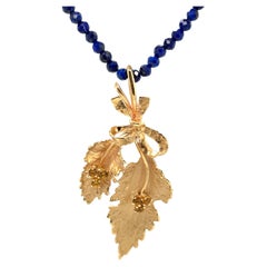 Mid-Century Leafy Sprig Pendant with Citrines in Yellow Gold on Lapis Bead Chain