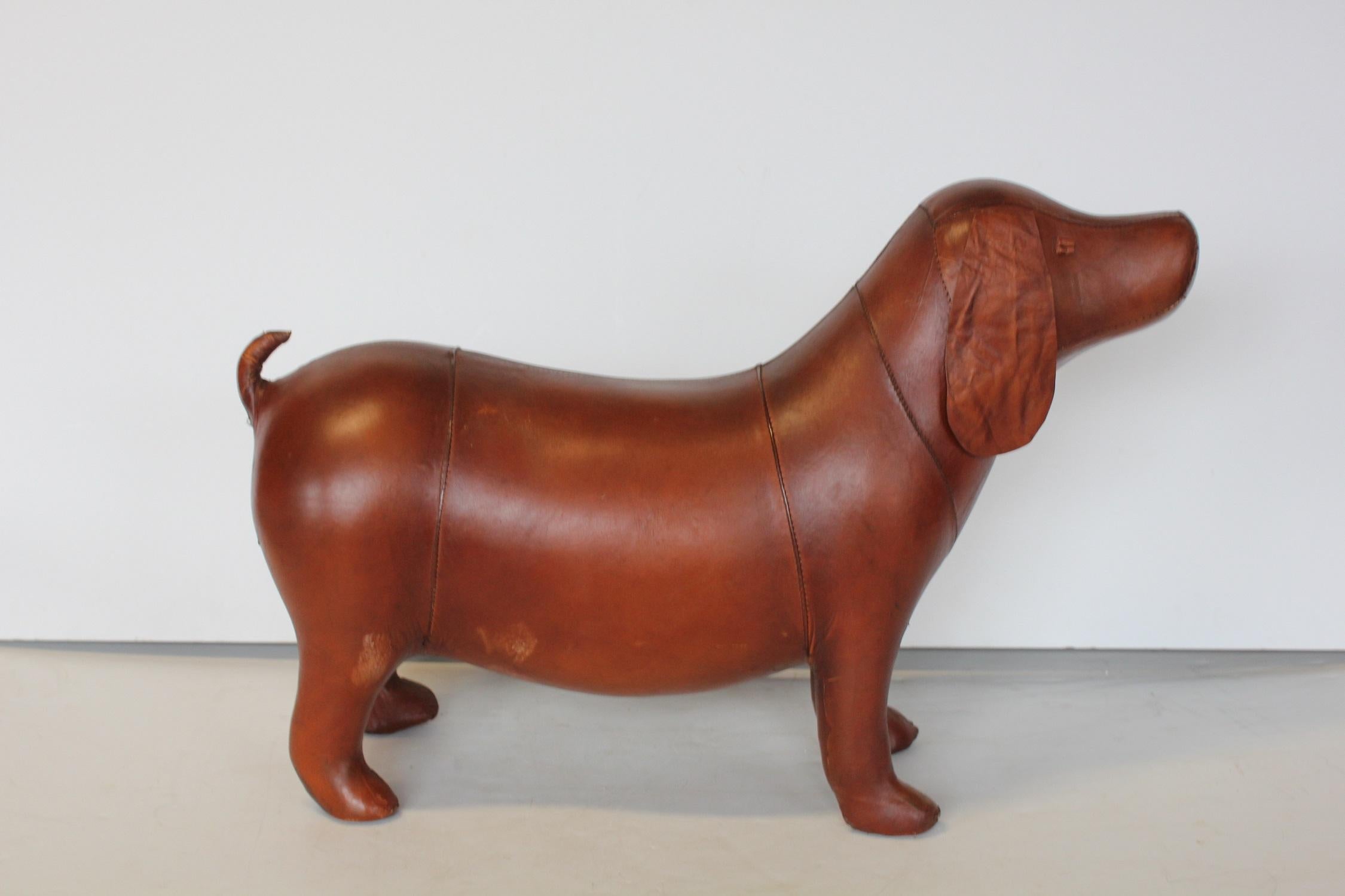 Midcentury leather dog footstool in style of Omersa for Abercrombie and Fitch.