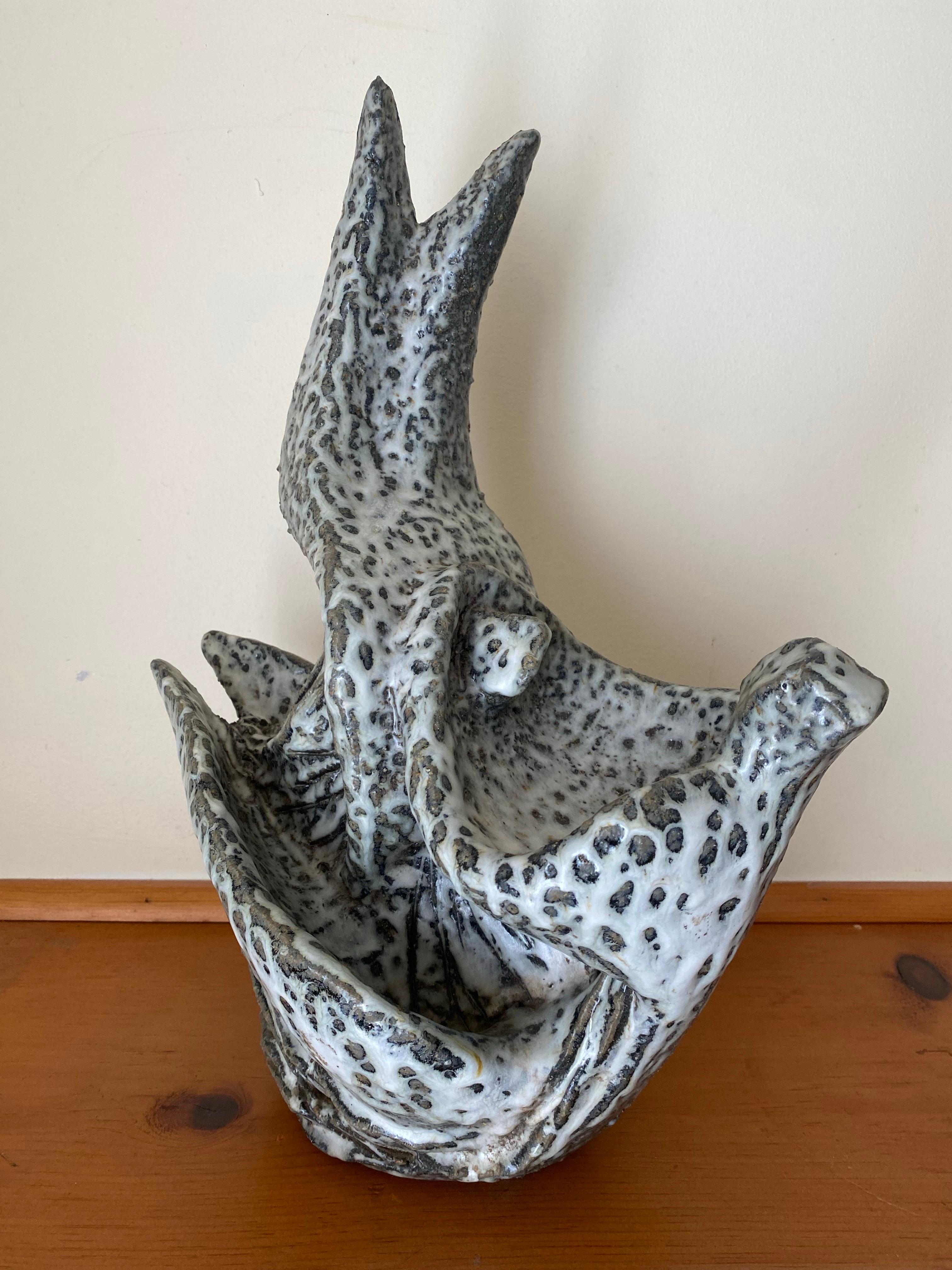 A mid-1960s Lee Rosen for Design-Technics brutalist, figural stoneware sculpture. The sculpture is fully signed 