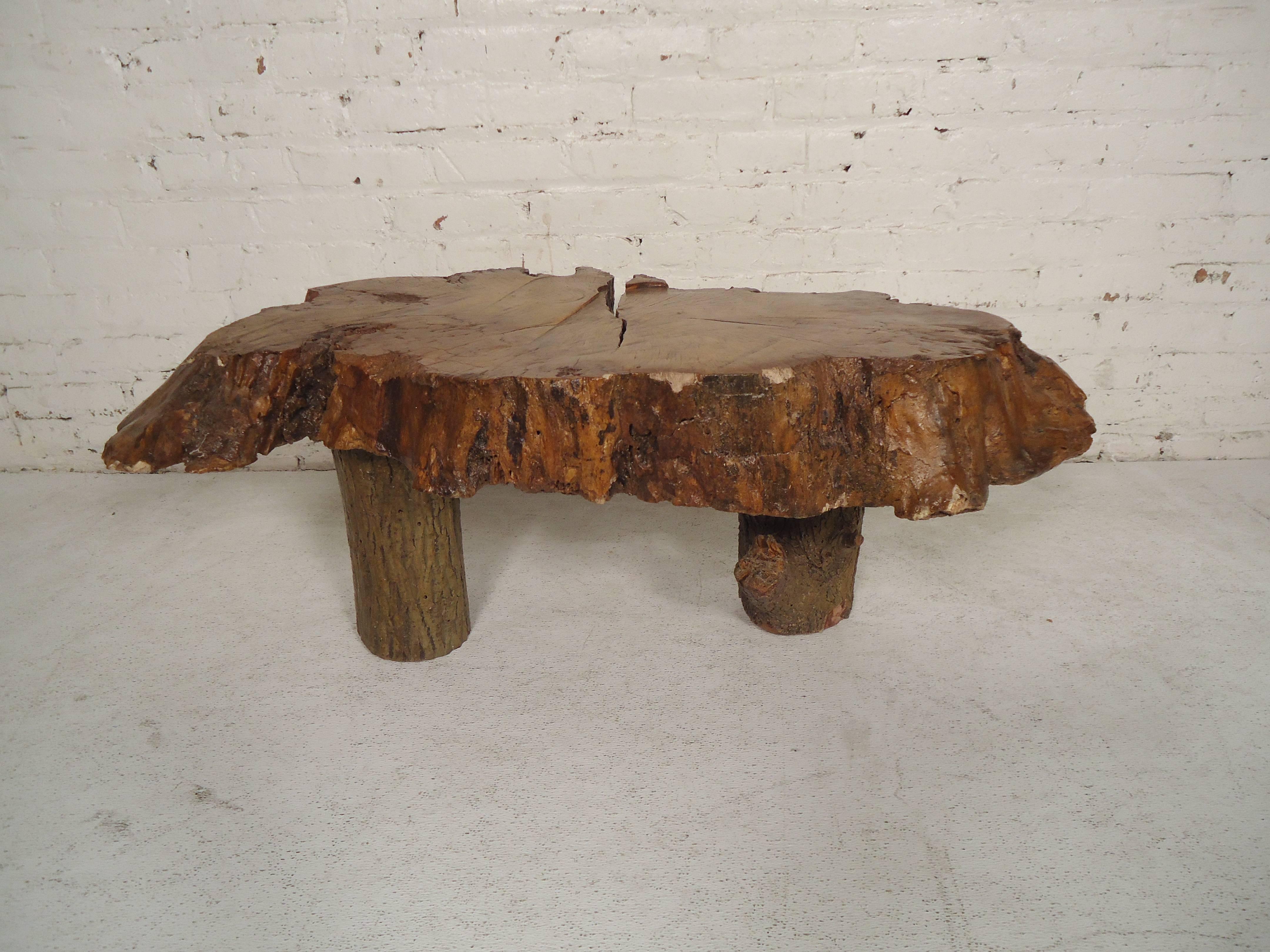 This beautiful vintage modern live edge bench features a unique tree slab top with elegant wood grain. Stylish design with thick wood legs ensuring maximum sturdiness. This stunning live edge table offers a taste of nature within any modern