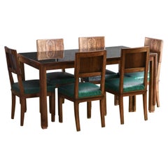 Tavolo da soggiorno del Midcentury con piano in vetro nero e sei sedie