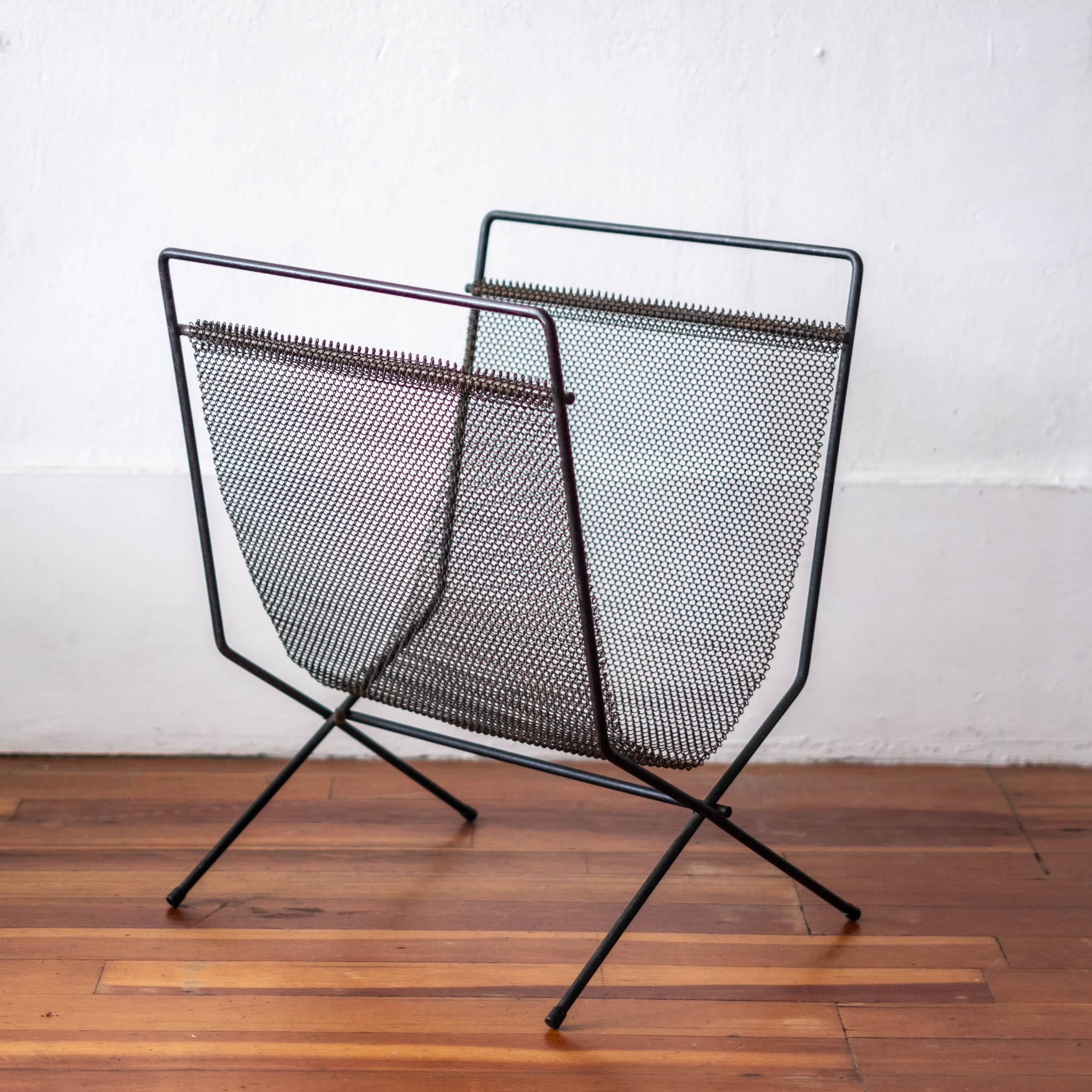 Modernist metal and iron log holder. Metal mesh sling with iron rod folding frame. Great Minimalist design.