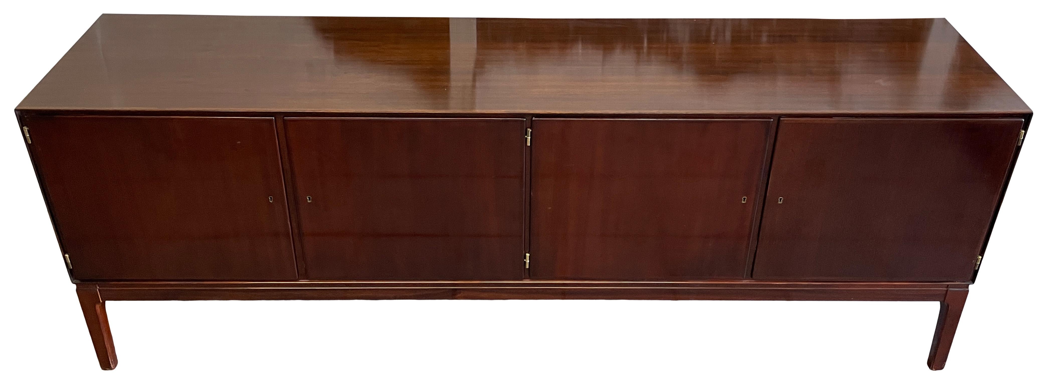 Midcentury long Danish modern teak credenza sideboard cabinet with 4 doors and 6 sliding drawers/trays 3 have green felt also has 5 adjustable shelves. Very clean teak wood credenza with rosewood finish. Has keyed locking teak front doors. Very