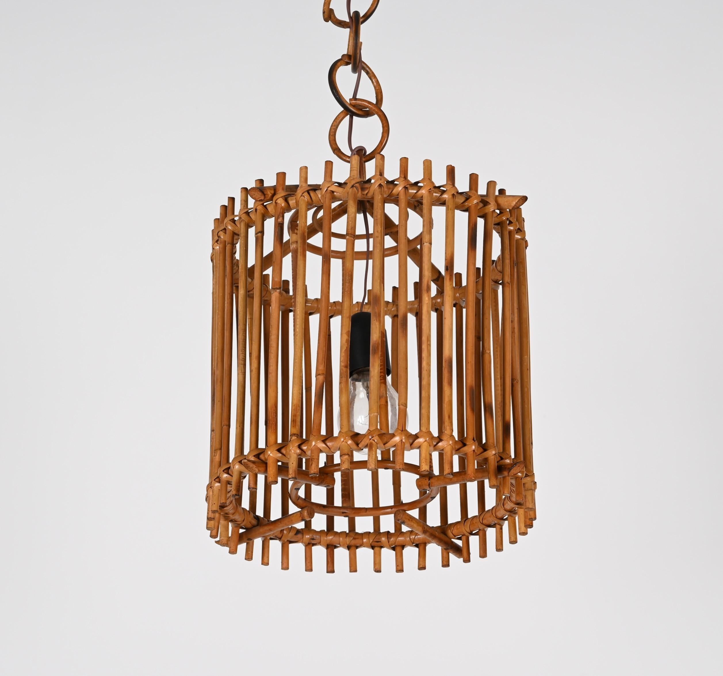 Amazing mid-century bamboo and rattan round chandelier. Louis Sognot probably designed this extraordinary in France during the 1960s.

An excellent example of mid-century craftsmanship, where bamboo and rattan are perfectly blended and shaped in a