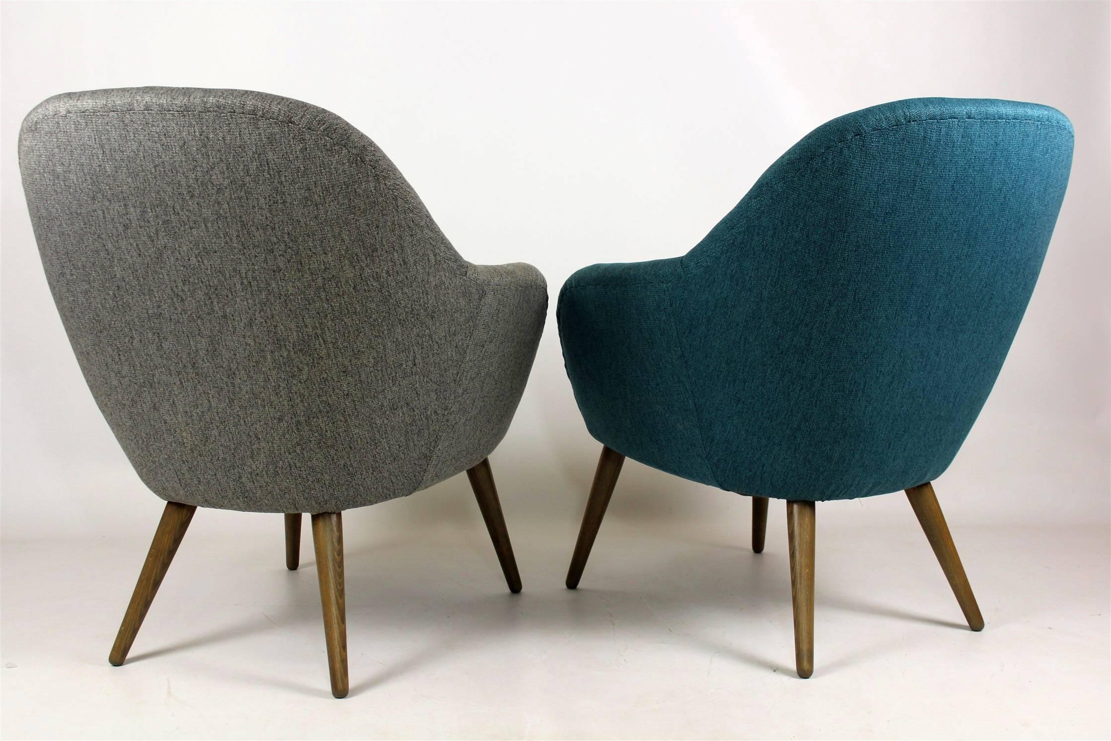 Pair of mid-century armchairs, produced in the late 1950s to early 1960s.
Made of wood, feature springed seats. Completely restored, satin lacquered woodwork, upholstered in grey and turquoise fabric.

