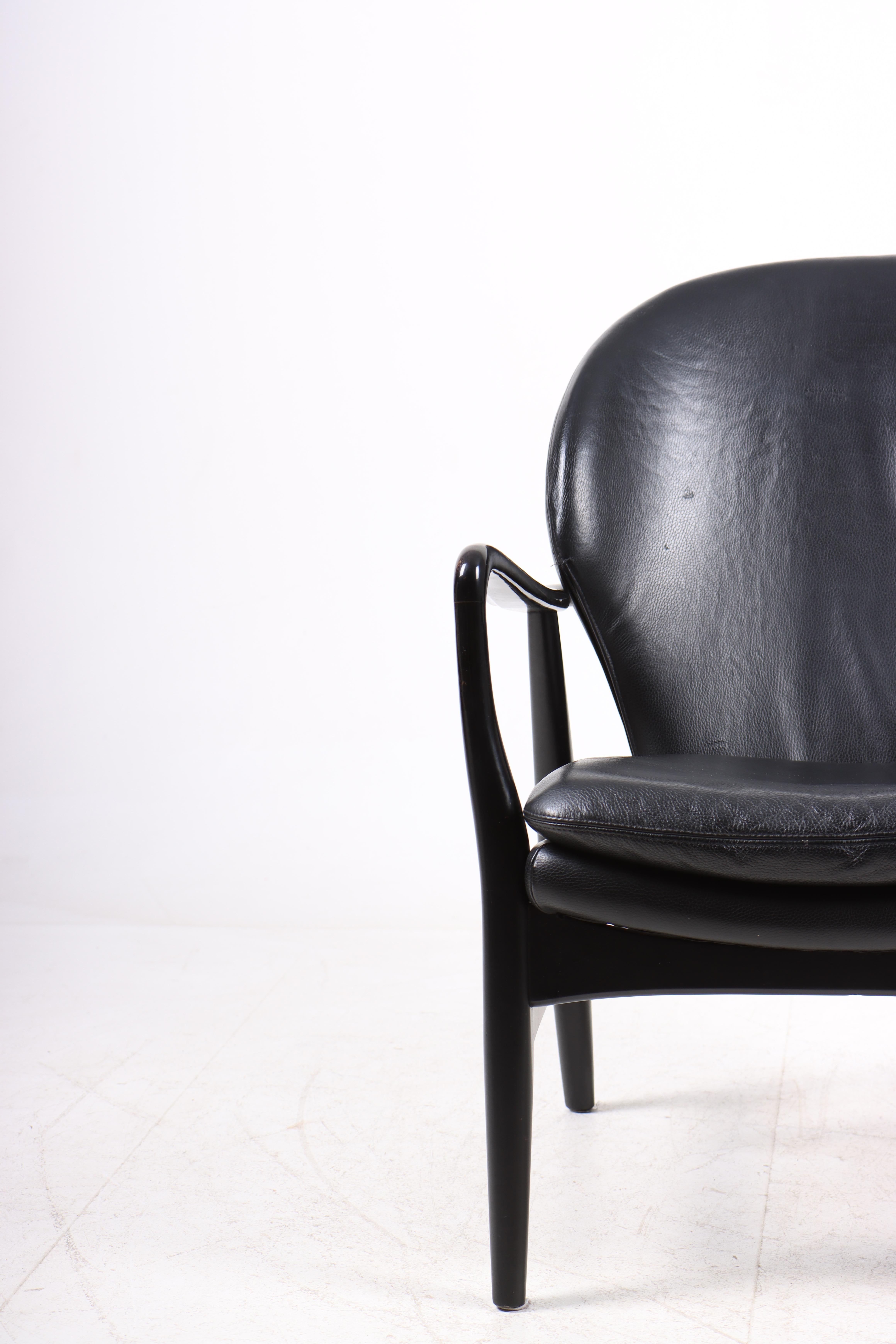 Lounge chair in leather, designed by Danish architects Ib Madsen & Acton Schubell.