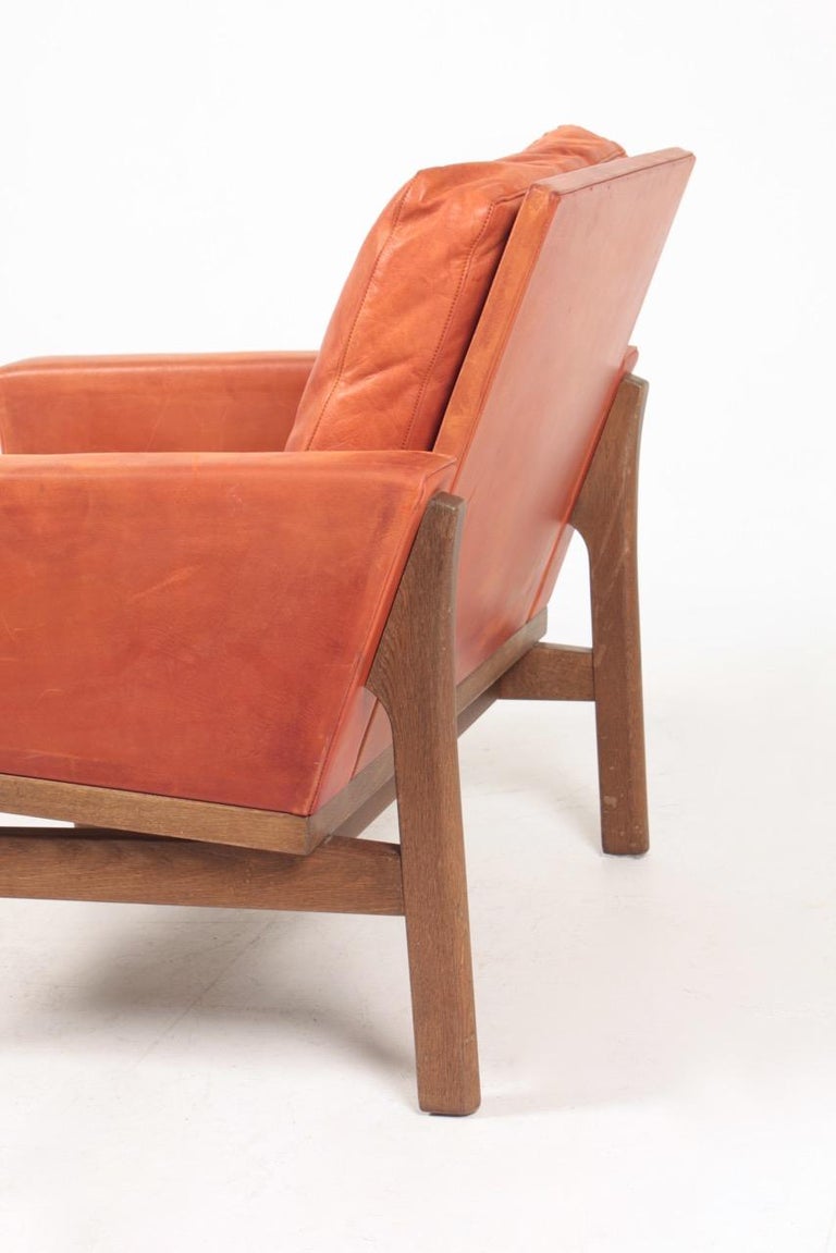 Danish Midcentury Lounge chair in Patinated Leather by Erik Jørgensen, 1960s For Sale