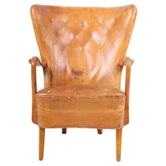 Midcentury Lounge Chair in Patinated Leather Designed by Alfred Christensen