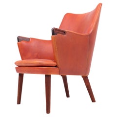 Midcentury Lounge Chair in Patinated Leather & Rosewood by Hans J. Wegner, 1950s