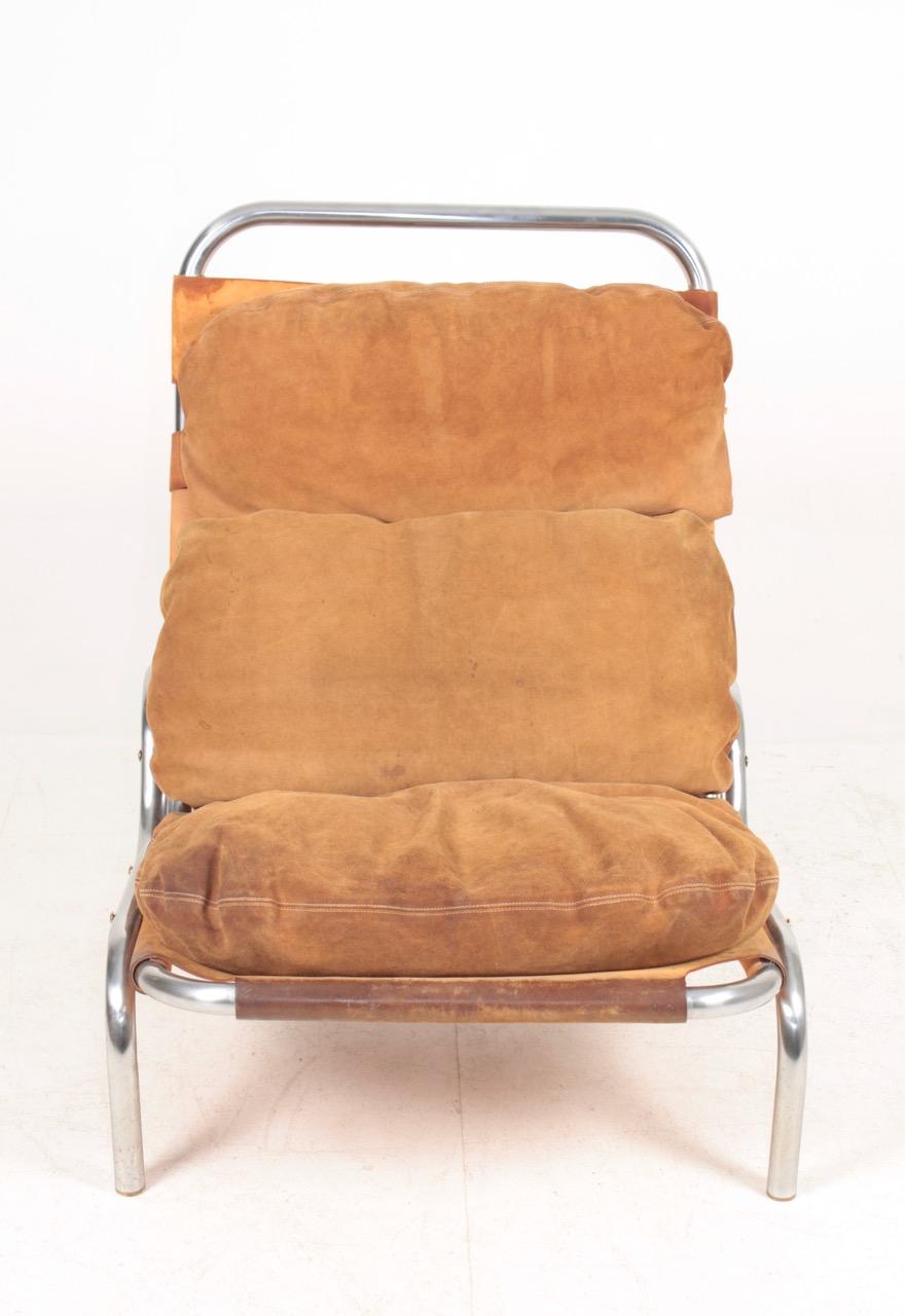 Danish Midcentury Lounge Chair in Patinated Suede and Steel by Erik Jørgensen, 1960s For Sale