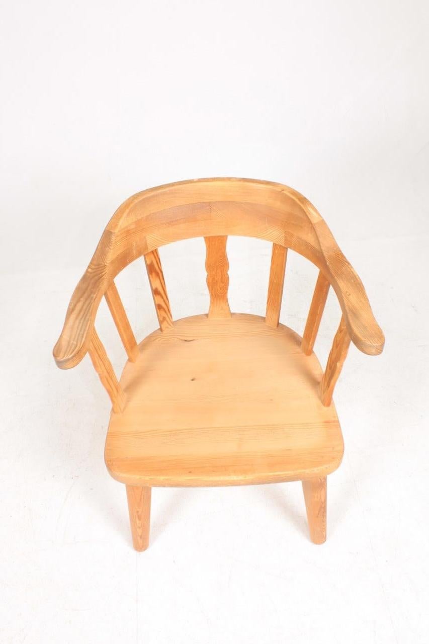 Lounge chair in solid pine designed and made in Sweden. Great original condition.