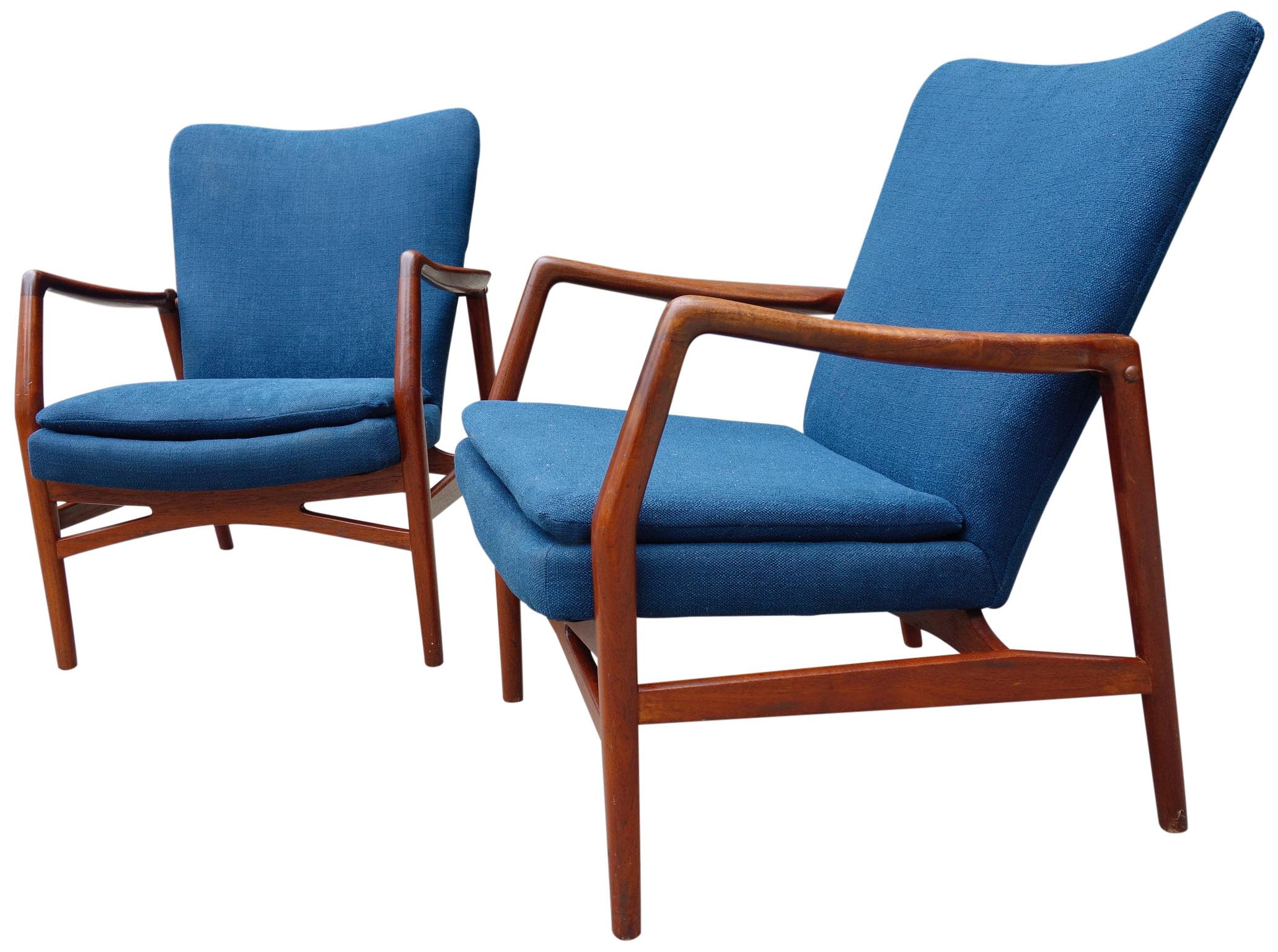 Danish Modern Kurt Olsen Model 215 wing back chairs for Slagelse Møbelvaerk. The frames are in wonderful condition showing a rich warm patina. Newly recovered in blue fabric.