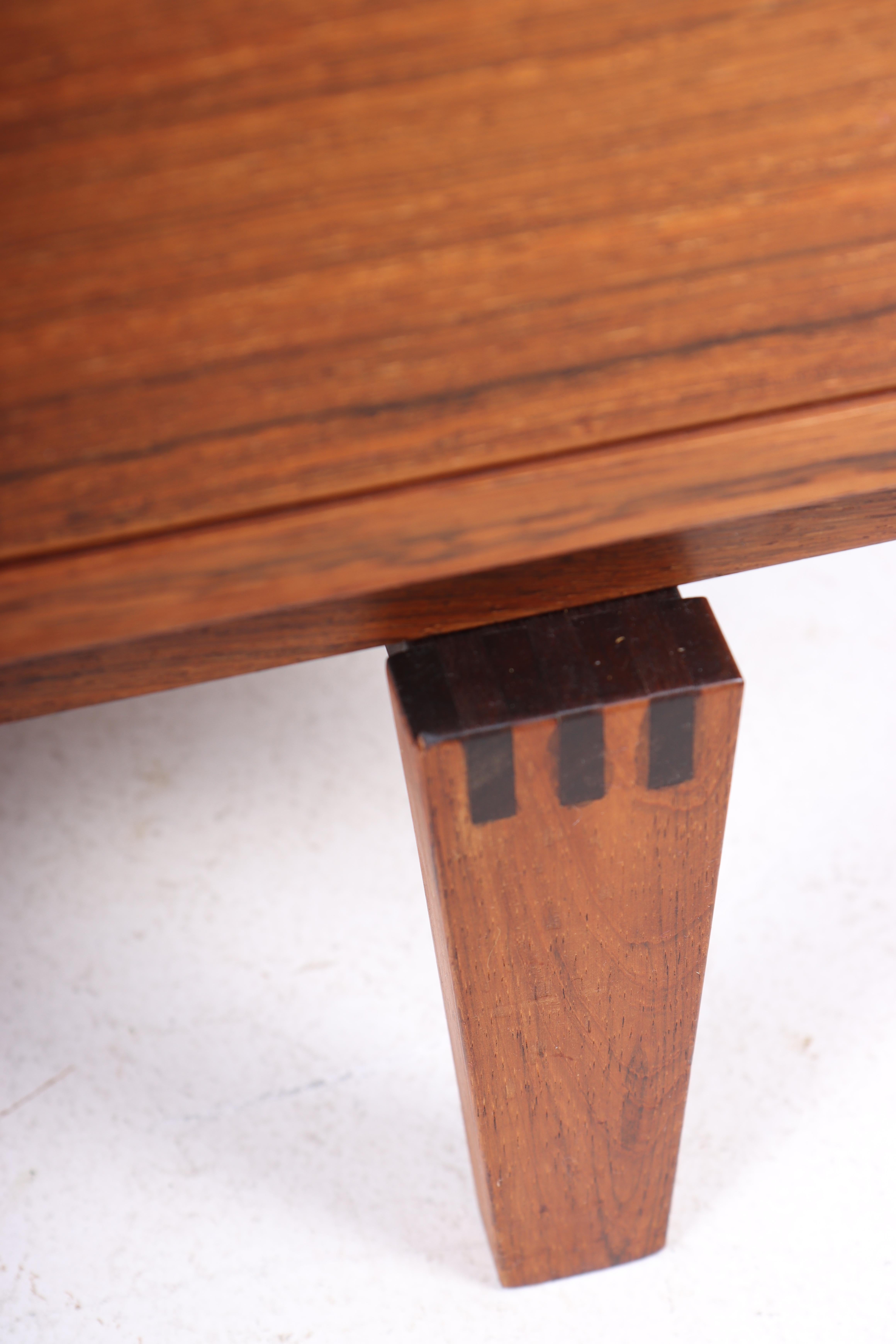 Cabinet in rosewood with brass hardware. Designed by Peter Løvig Nielsen, Denmark in the 1960s. Great original condition.