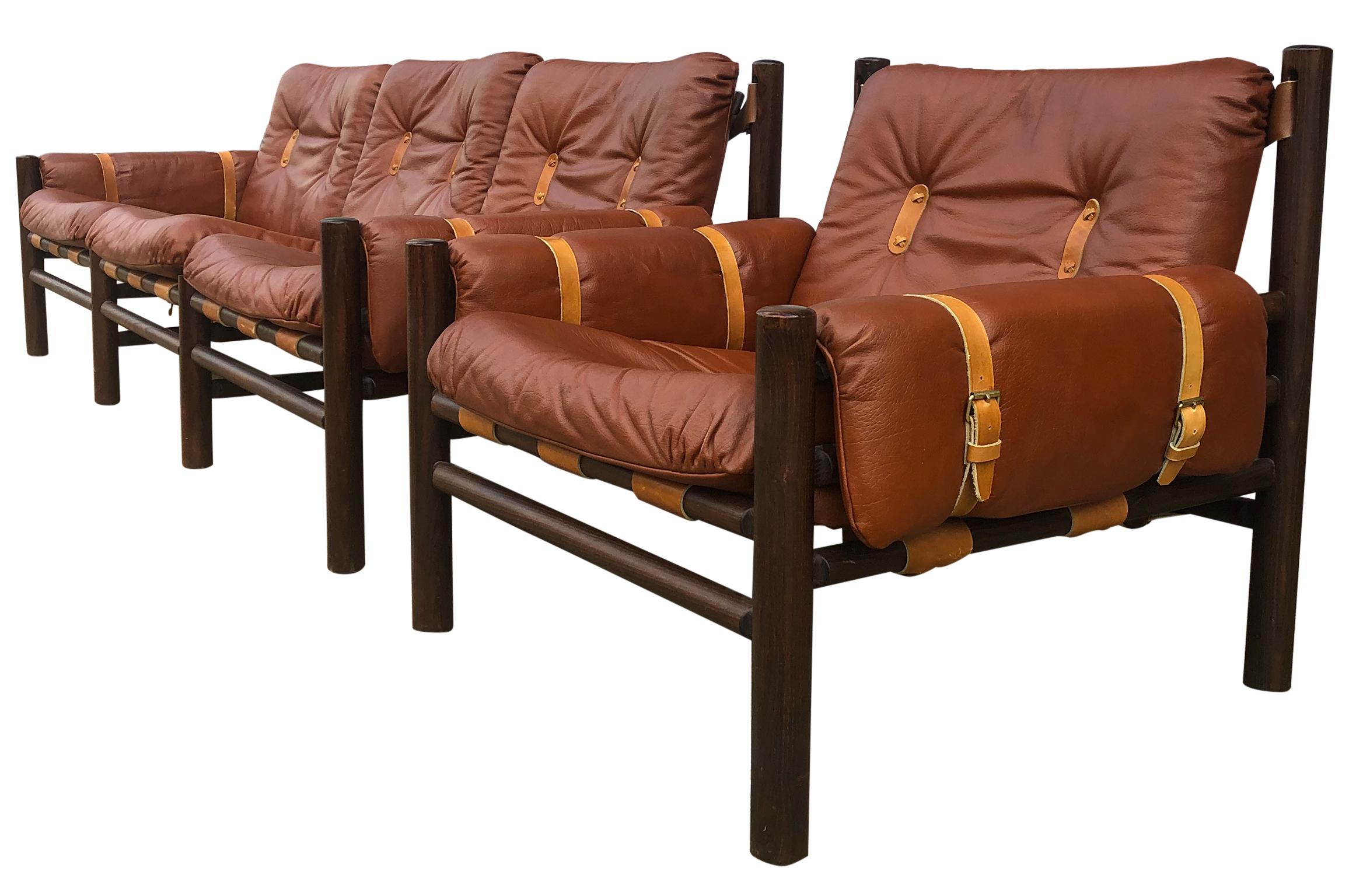 Beautiful Unique Midcentury low sling leather safari 3-seat sofa lounge chair set by Bruksbo - Norwegian Designer. The founder of Lom Møbler later Lom Møbelfabrikk, Ivar Opsvik, designed this beautiful safari-inspired chair in the 1970s. Very soft