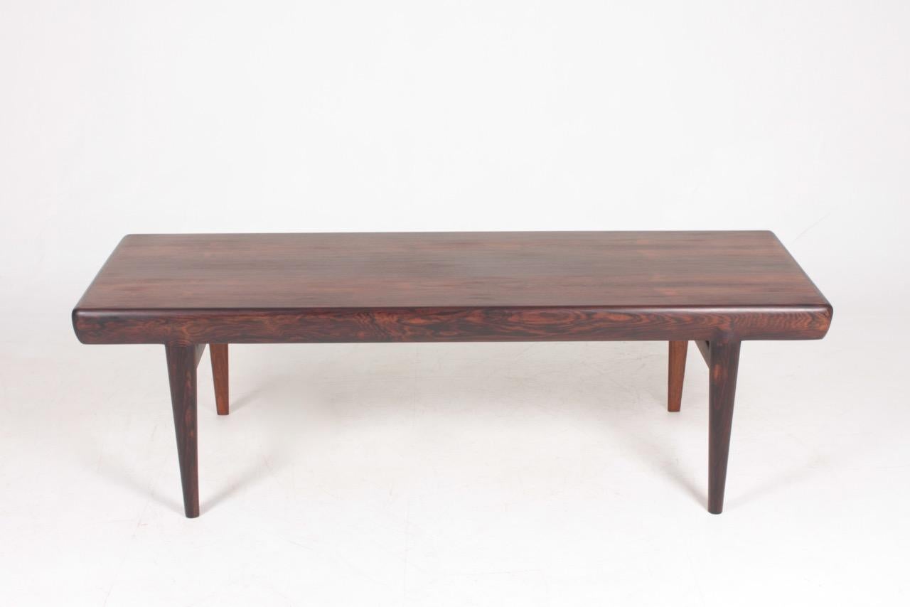 Low table in rosewood designed by Maa. Johannes Andersen for CFC Furniture in 1960s. Great condition.