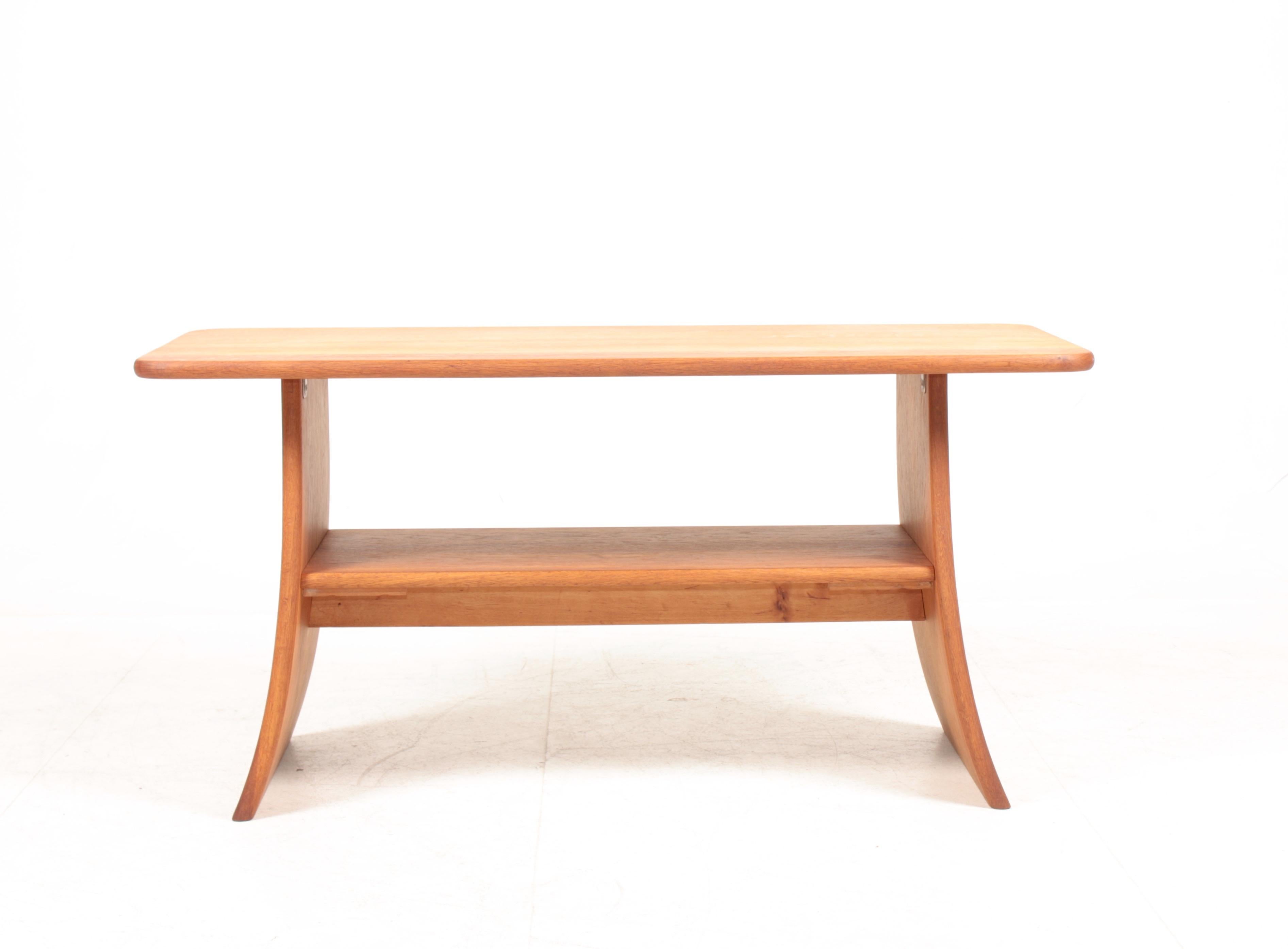 Low table in solid oak designed and made by a danish cabinetmaker. Great condition.