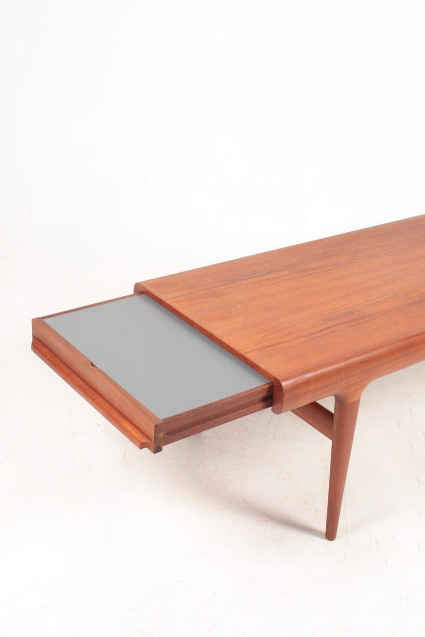 Low table in teak designed by Maa. Johannes Andersen for CFC Furniture in 1960s. Great condition.