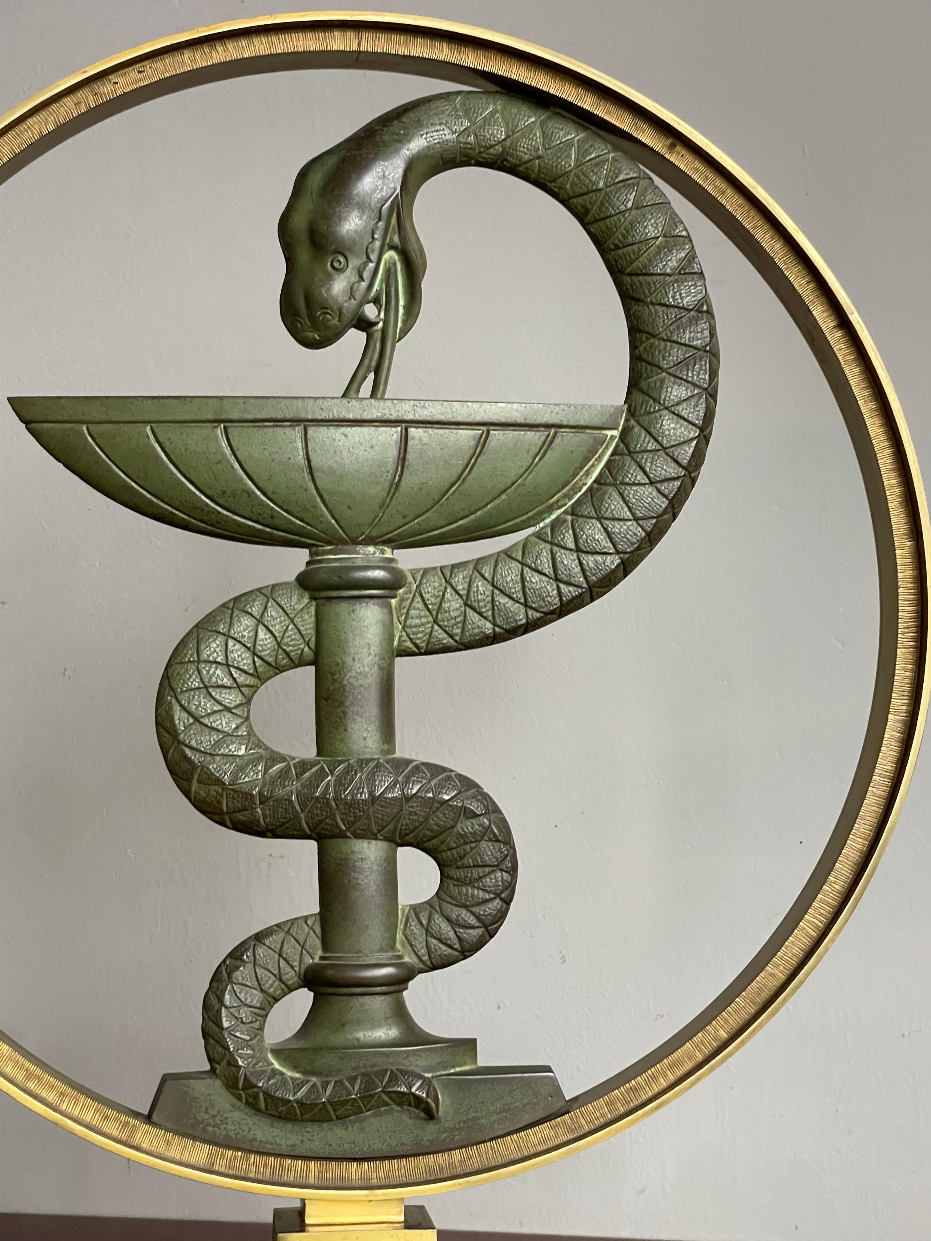 Unique, sizable and top quality workmanship 'pharmacy sign'.

Some antiques you only find once in your life and we believe that we will never again find a handcrafted sign of such rarity, beauty and quality as this solid bronze and brass bowl of