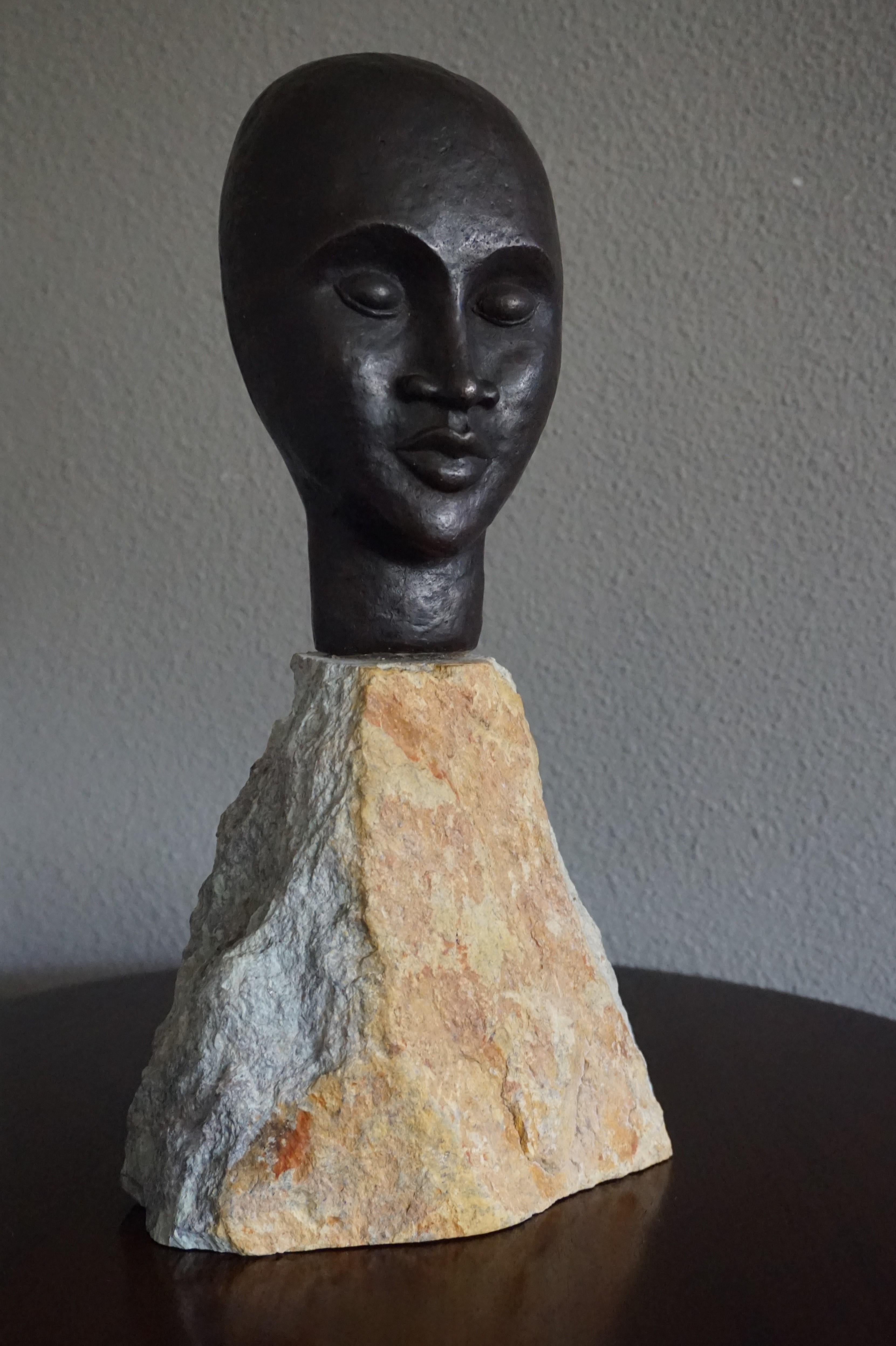 Midcentury Made Bronze Sculpture of a Serene African Male on a Limestone Base In Excellent Condition For Sale In Lisse, NL
