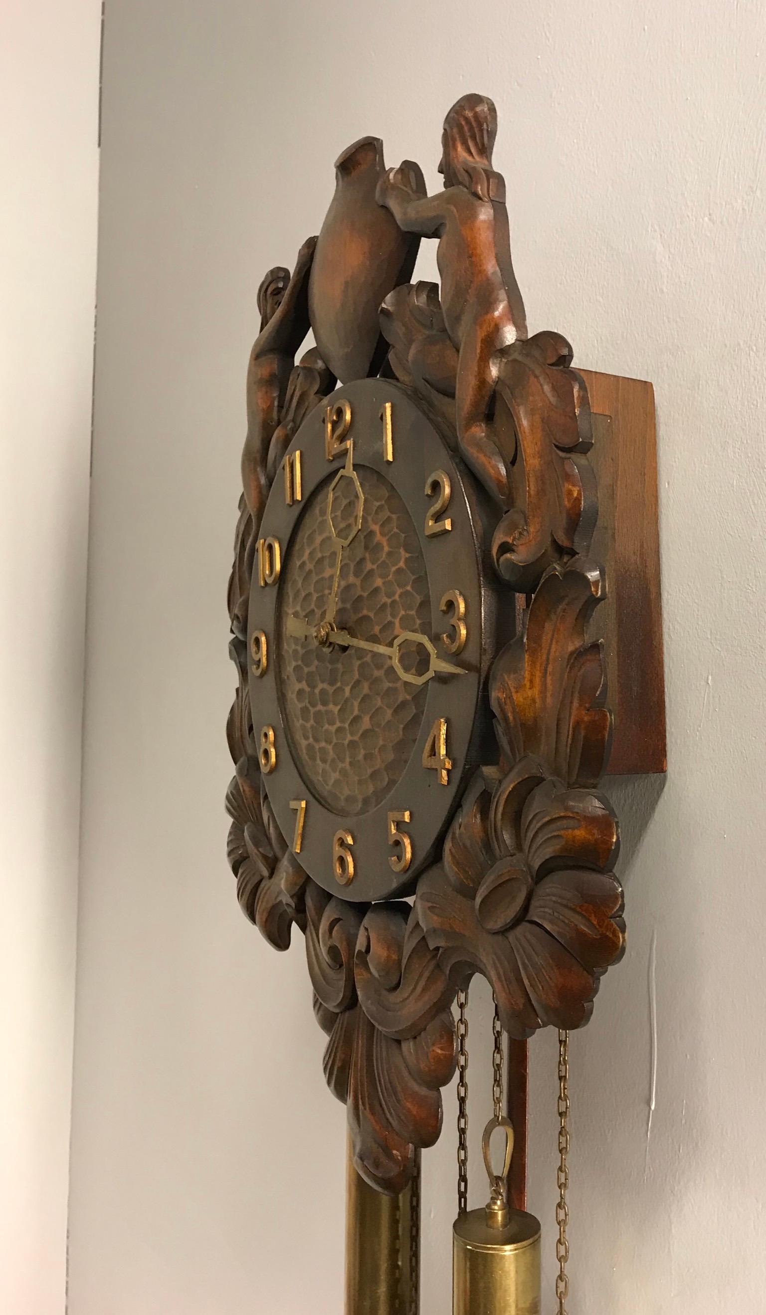 Brass Unique Denmark Made Classical Roman Wall Clock with Sculptures and Flowers For Sale