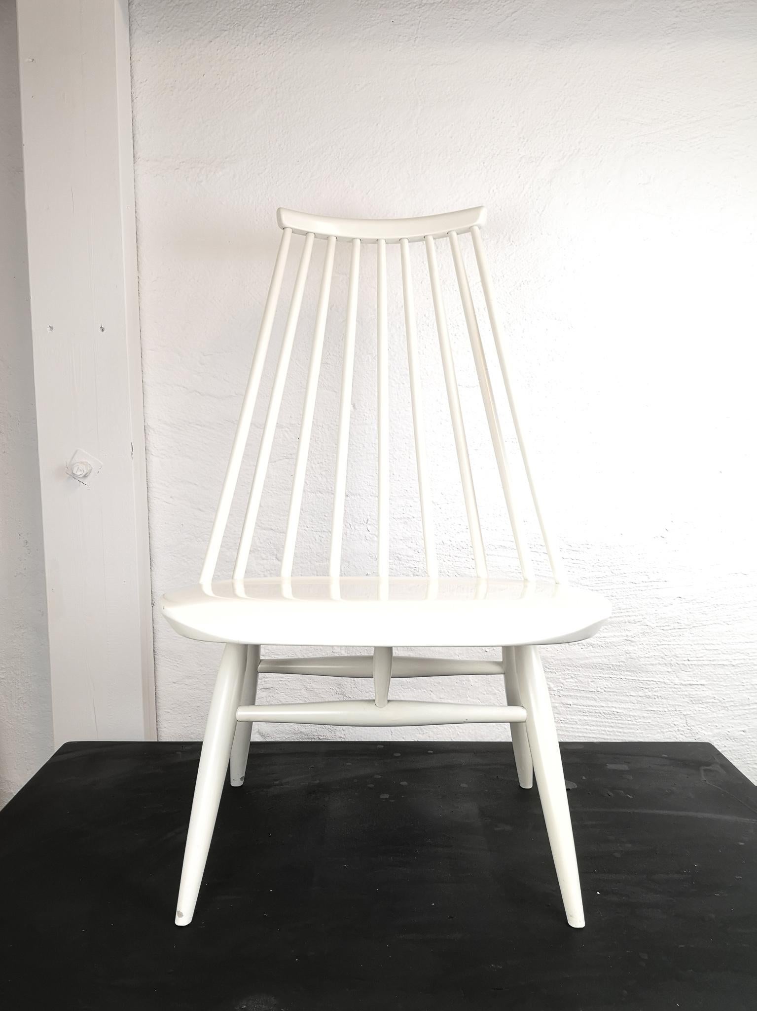 This Iconic 'Mademoiselle' chair designed by Illmari Tapiovaara for Edsby-verken, Sweden, with unique bentwood seats and curved backrest, original pale chartreuse finish, marked with sticker to the underside. This is the original made at Edsbyverken