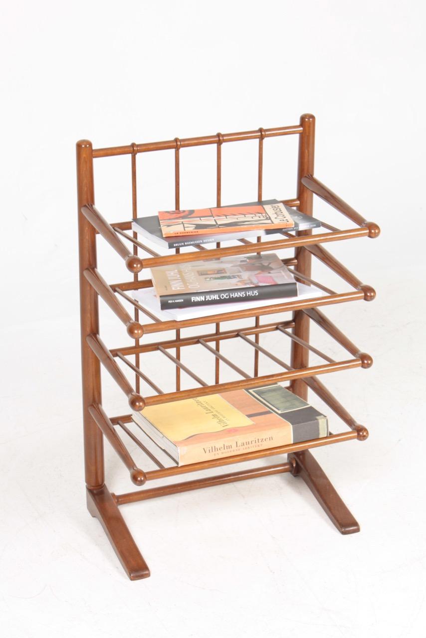 Magazine rack in solid beech. Designed by Frits Henningsen for Andreas Tuck. Made in Denmark. Great original condition.