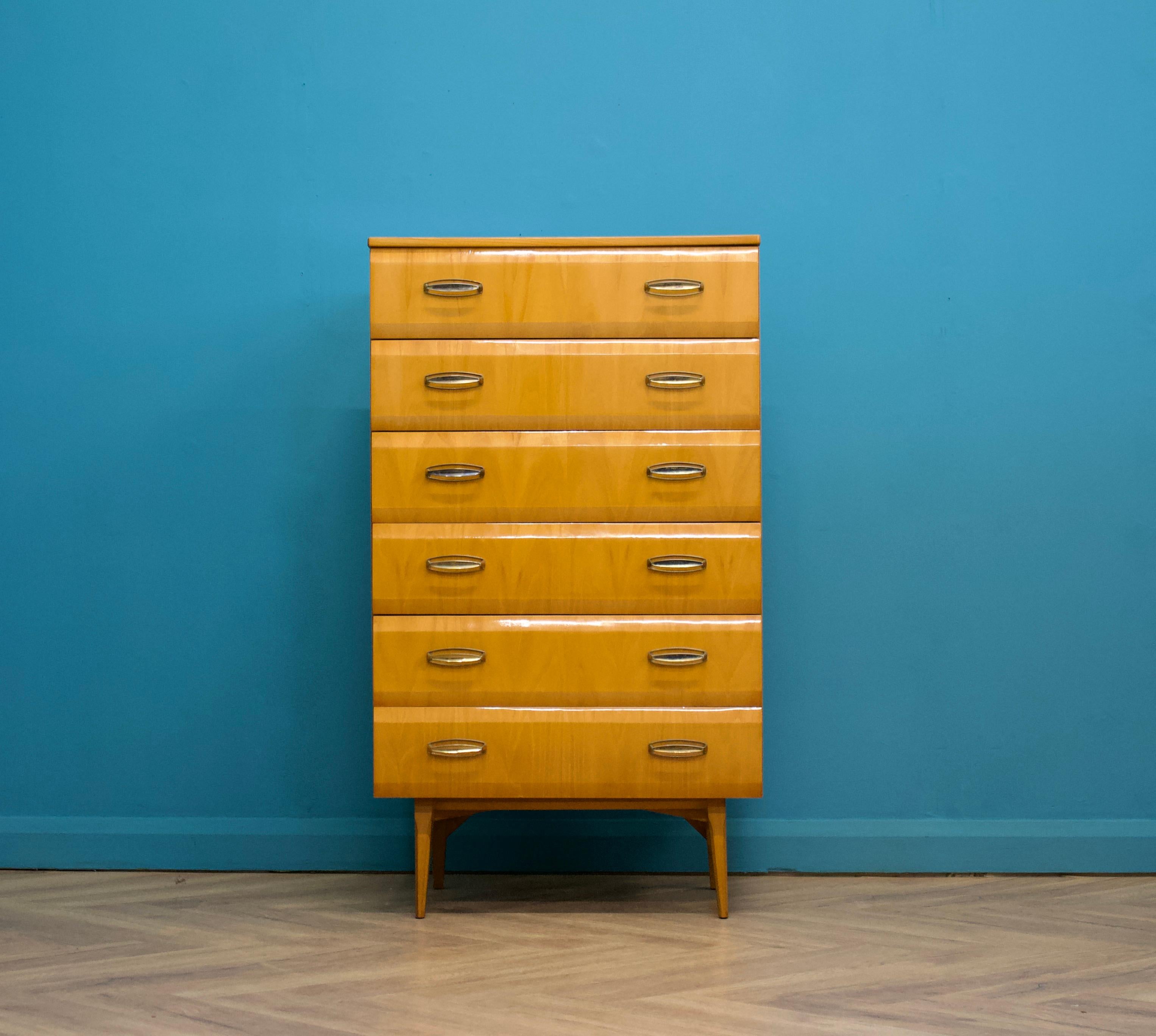 A mid century Italian style maple tallboy chest of drawers - from the quality furniture makers, Meredew, circa 1960s
There are six drawers in total
Finished in high gloss

The matching dressing table is listed for sale separately