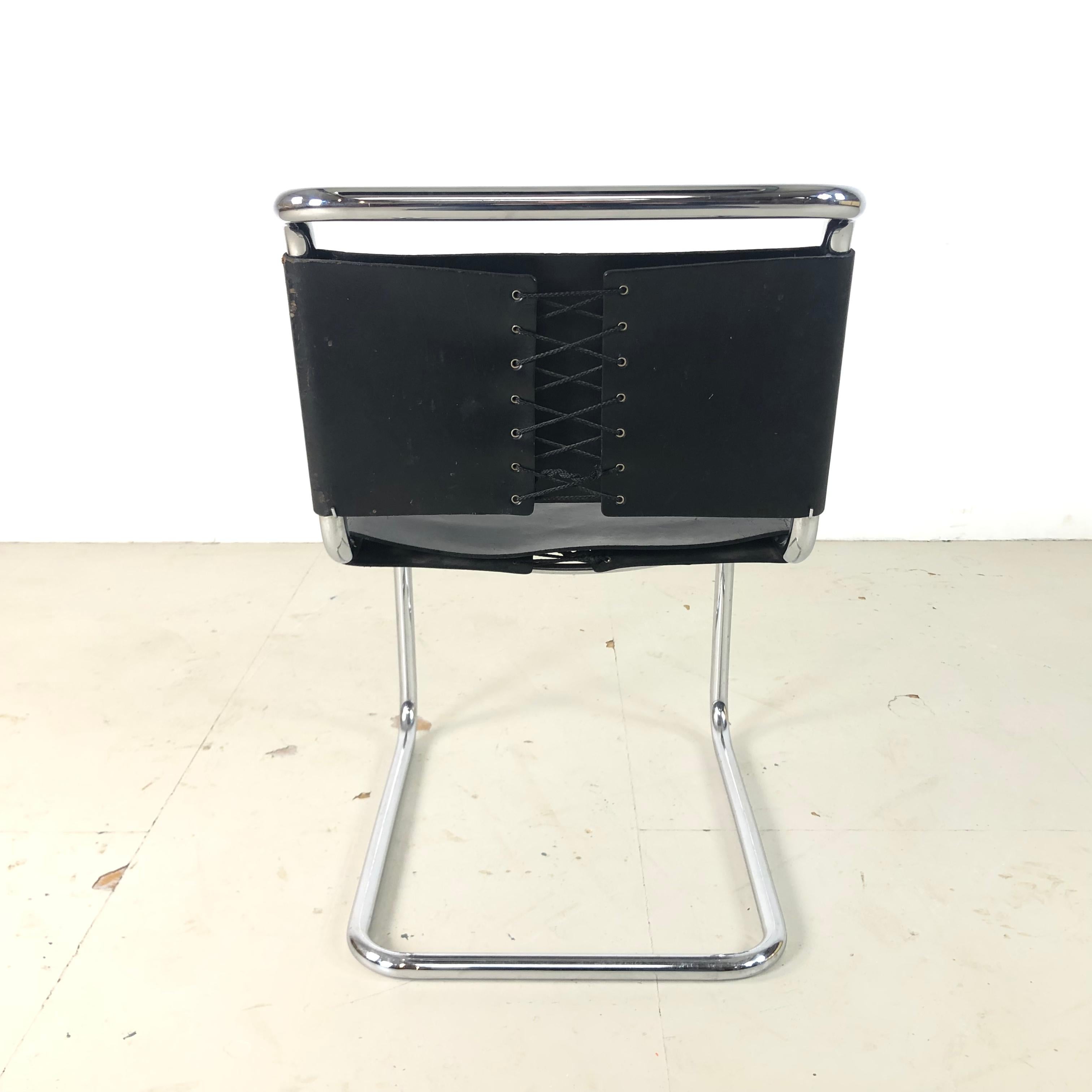 Marcel Breuer style cantilever chair. Lovely as a desk chair.

Tubular frame with black leather seat. 

In good vintage condition. Some wear and tear, commensurate with age, but nothing which detracts.

Approximate dimensions:

Height