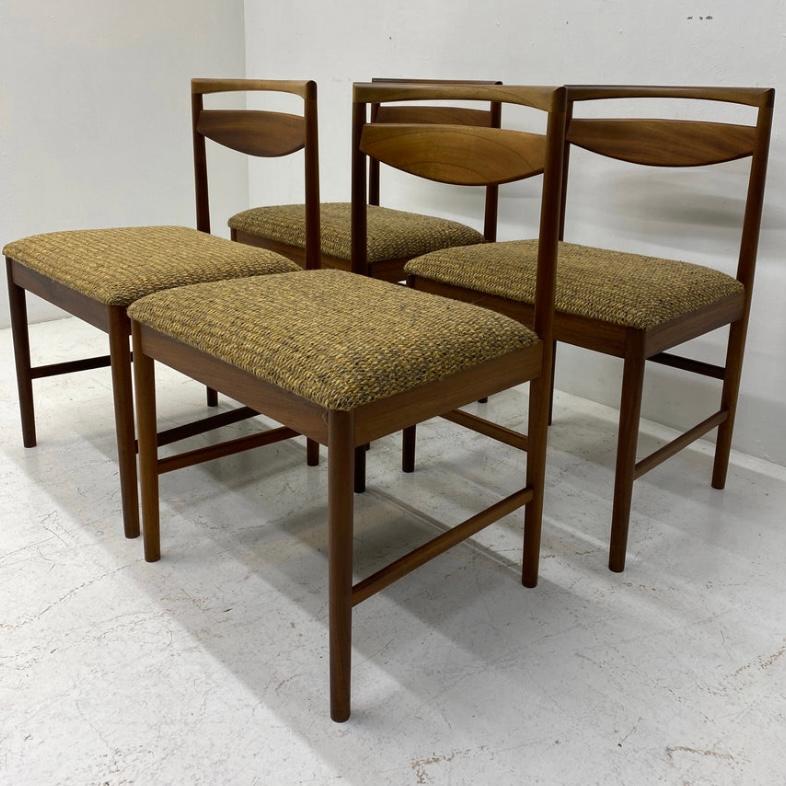A stunning set of four midcentury McIntosh & Co of Kirkaldy Scotland dining chairs. The dining chairs are a great design & shape & the teak has been refurbished. The seats are in their original tweed in warm autumnal colours. They are very classy &