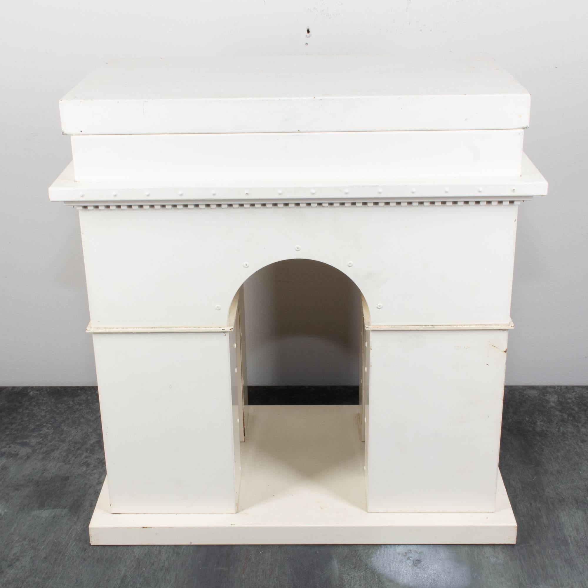 This is a fantastic metal scale model of the famous Arc de Triomphe in Paris, France, crafted in the 1950s. The ivory painted finish gives this sculpture a very austere appearance, and has a removable 