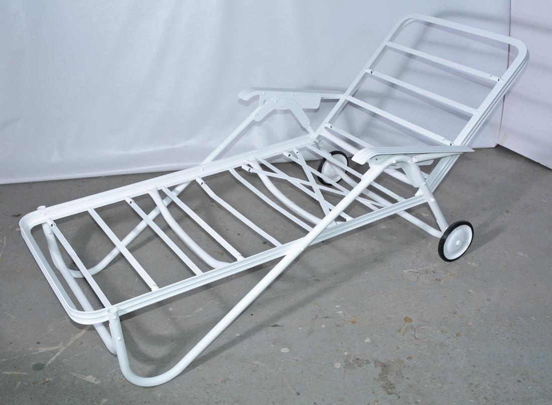 Midcentury reclining chaise longues made of flat tubular metal with newly painted outdoor white paint. Original rubber wheels. A second similar style available.