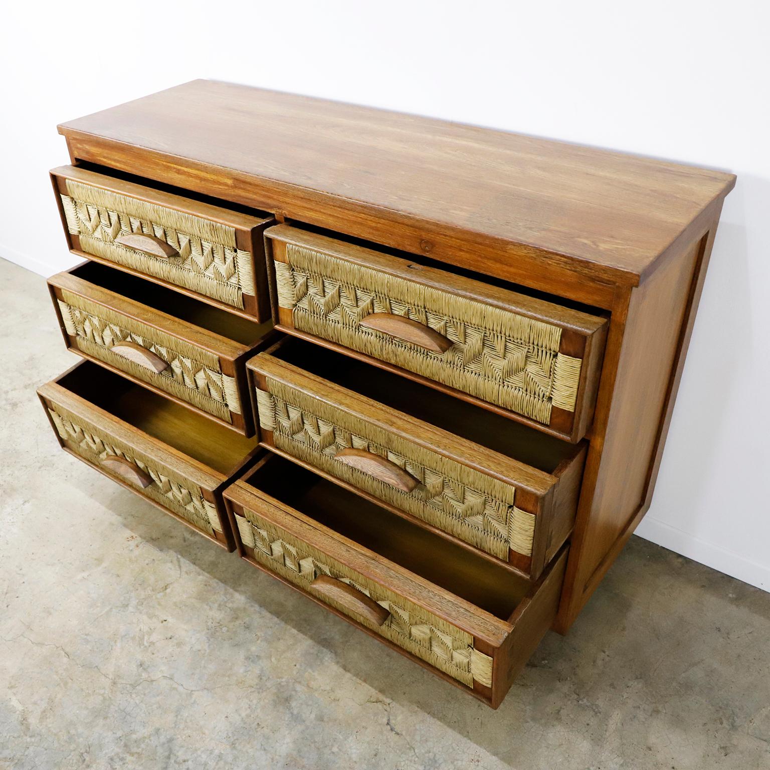 We offer this midcentury Drawer in the style of Clara Porset made in premium solid mahogany wood and palm cords, circa 1960. Excellent vintage condition, palm is all original and the mahogany case has been professionally refinished. A fantastic