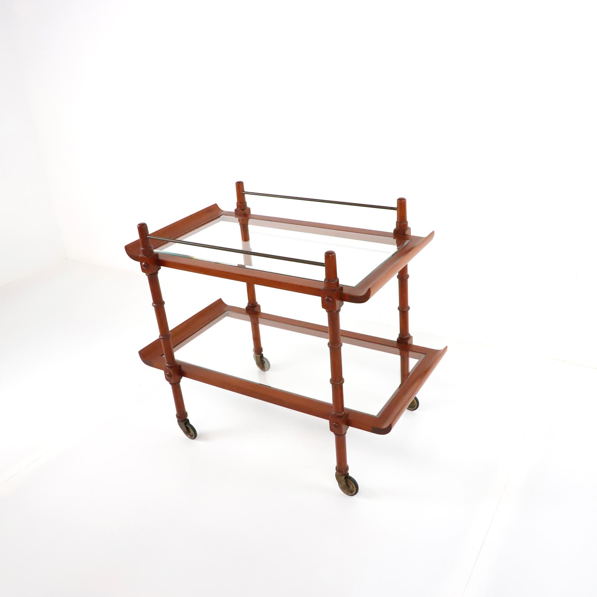 Rare rolling bar or serving cart made of mahogany and steel, designed by Frank Kyle, circa 1950.