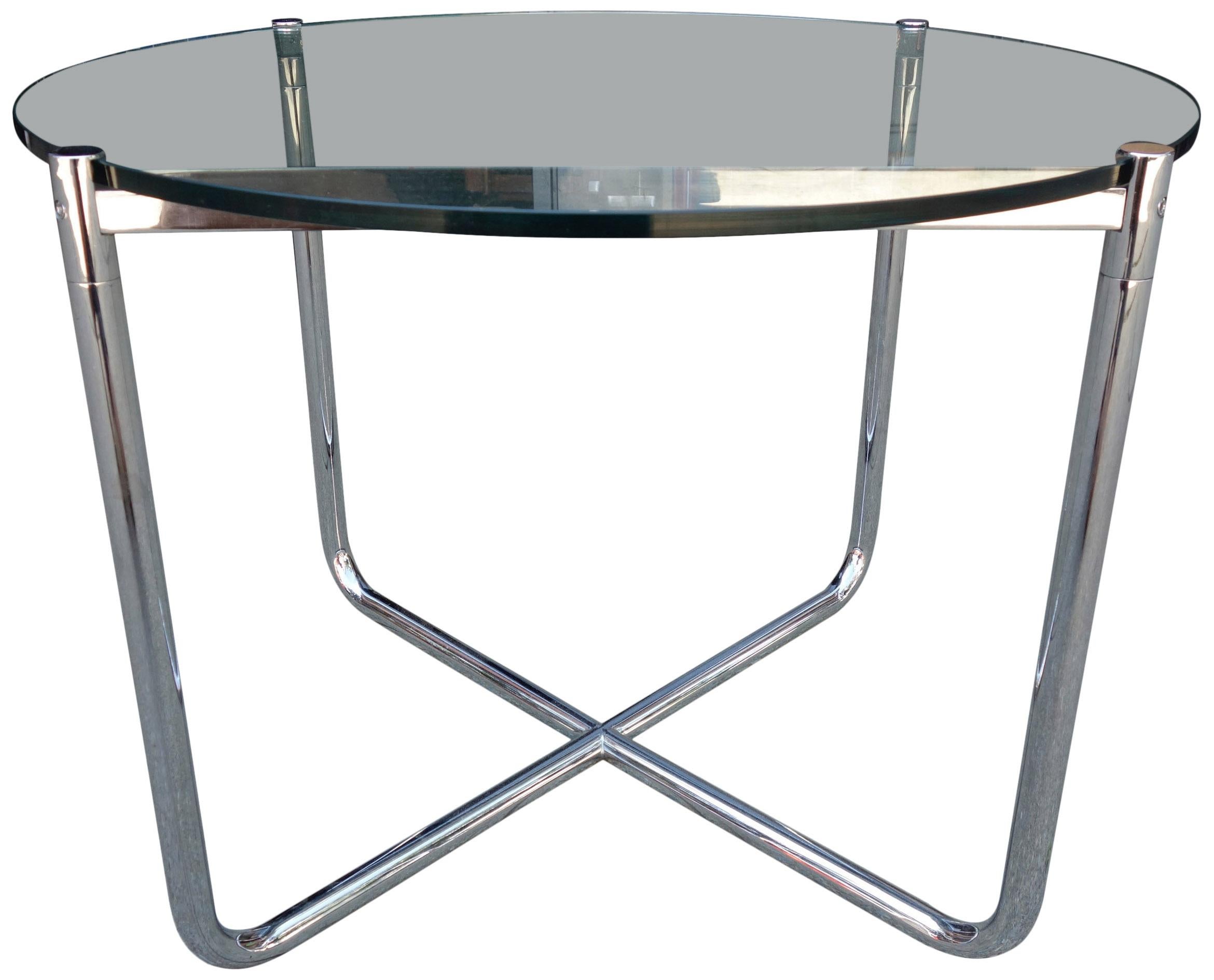 For your consideration is this beautiful heavy chromed round side table fitting perfectly with the Barcelona lounge chairs. Featuring a thick glass top and bent tube frame. The top can be removed from the frame for easier moving. The width is 28 1/2