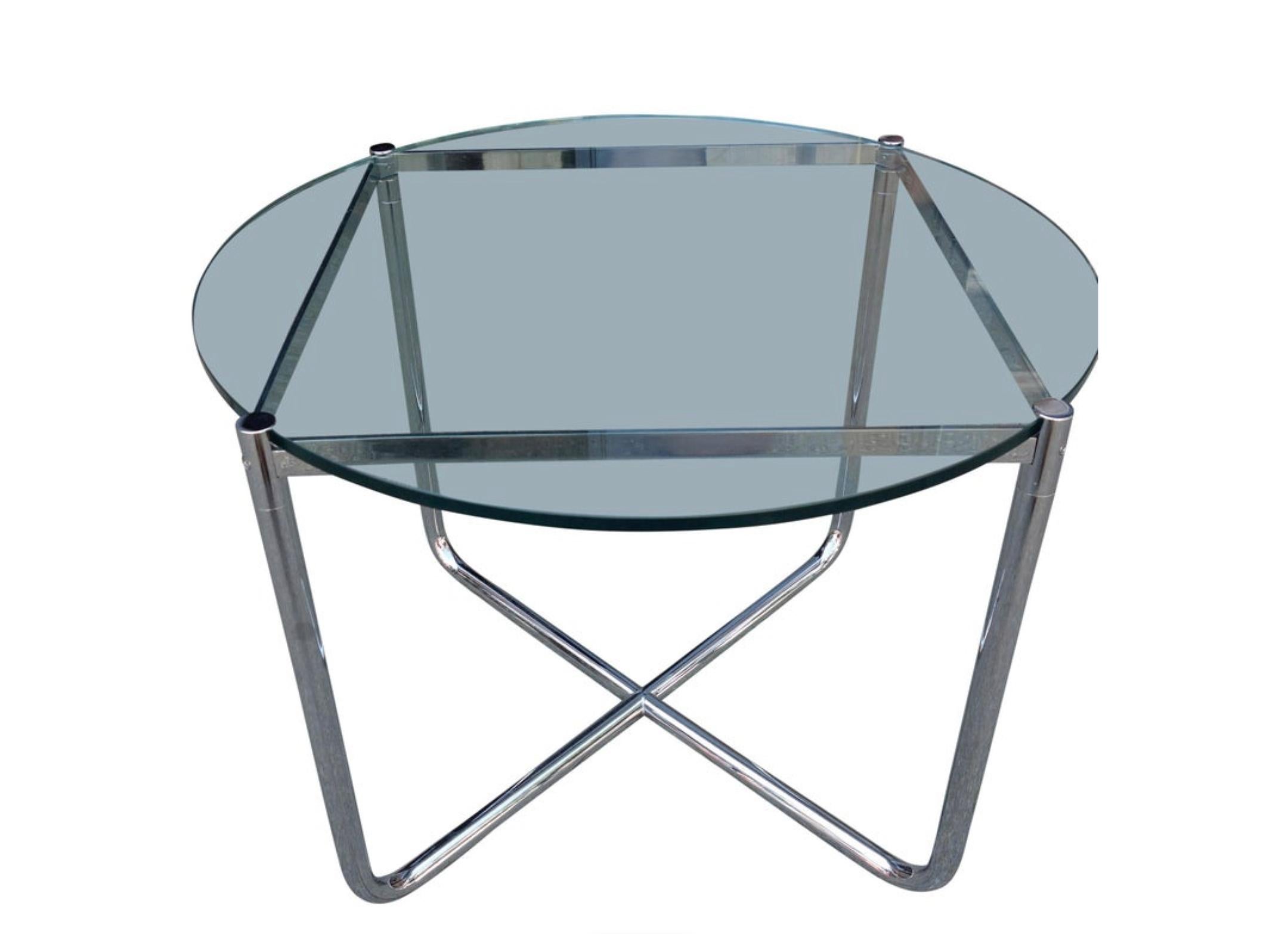 For your consideration are these beautiful heavy chromed round side tables fitting perfectly with the Barcelona lounge chairs. Featuring a thick glass top and bent tube frame. The top can be removed from the frame for easier moving. The width is 28
