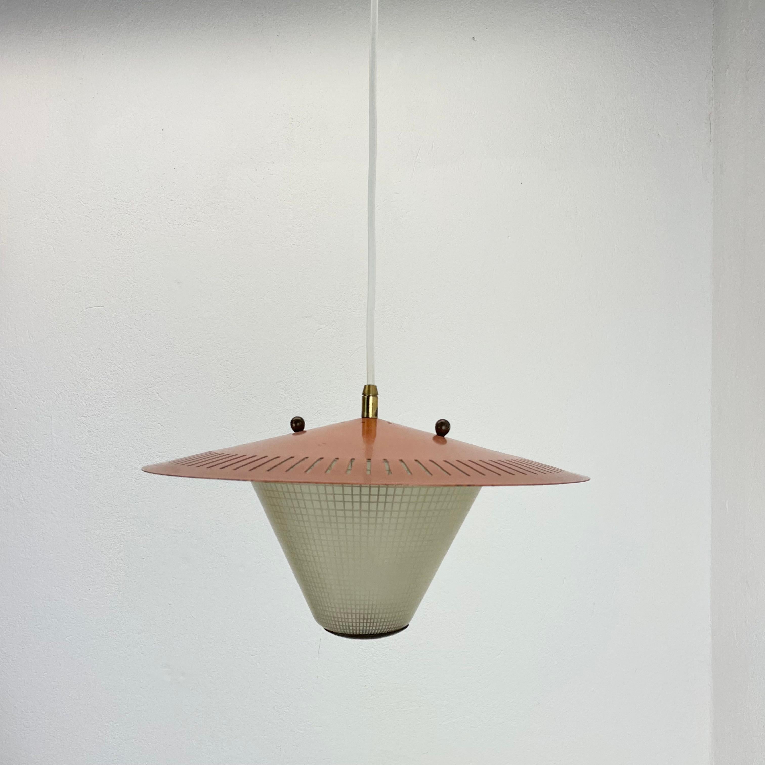 Article: Hanging light 


Origin: Italy


Age: 1950s


 

This fantastic hanging light was designed and produced in 1950s in Italy. The shades are made of metal with a nice formed glass element underneath which covers the  light bulb. the glass