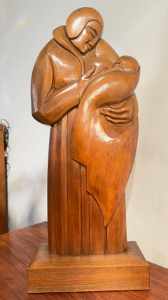 Scultura in legno in stile Mid-Century Modern degli anni '50 raffigurante la Madonna con Bambino, opera di M. Plisnier