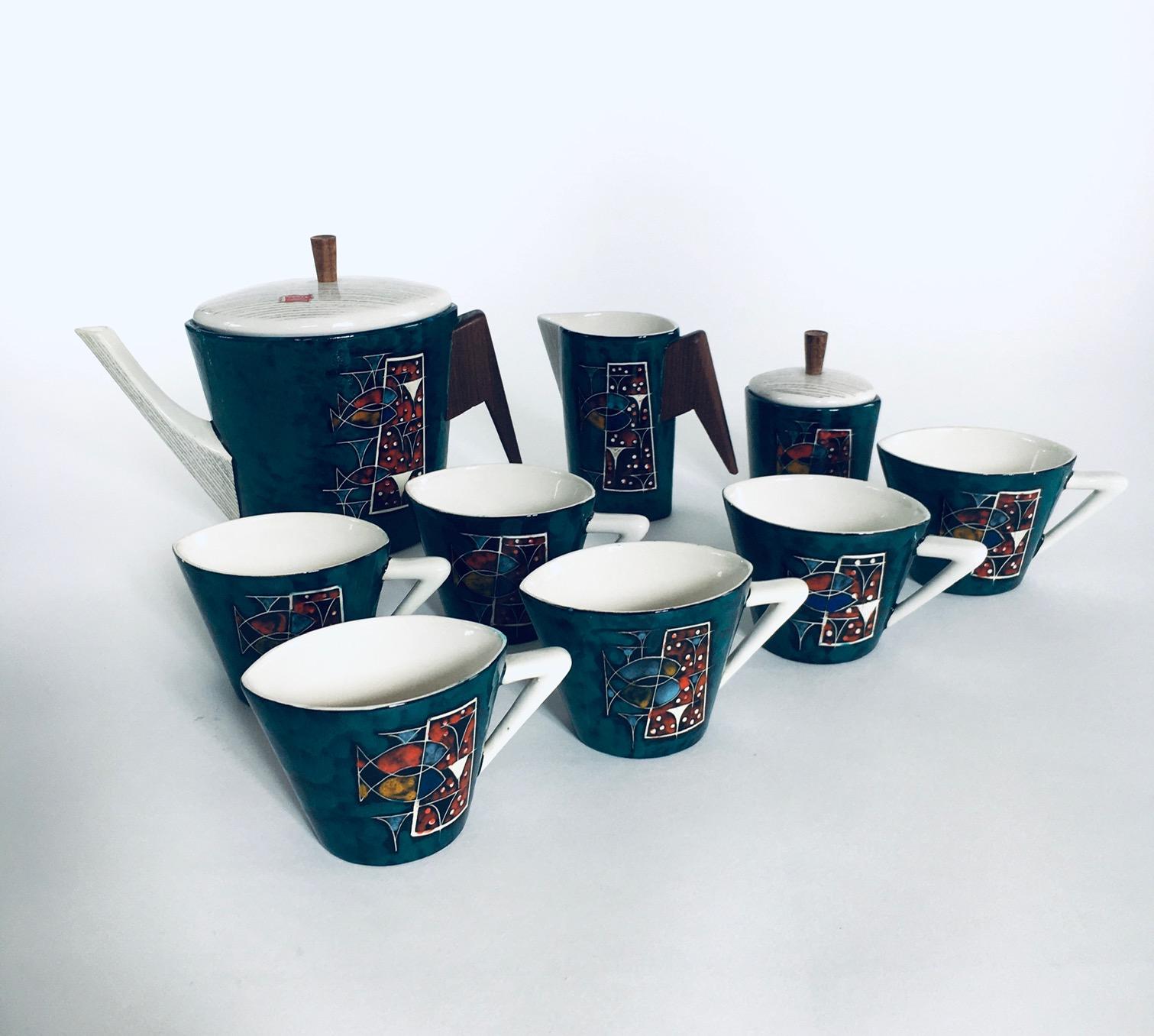 Vintage Midcentury Art Ceramic Coffee or Tea Service set by CEMAS, Italy 1950's. Marked with original sticker; C.E.M.A.S. Sesto Foirentino and on the bottom: 8137 CEMAS. This set consists of a Tea or Coffee pot, Sugar bowl, Milk jug and 6 cups. All