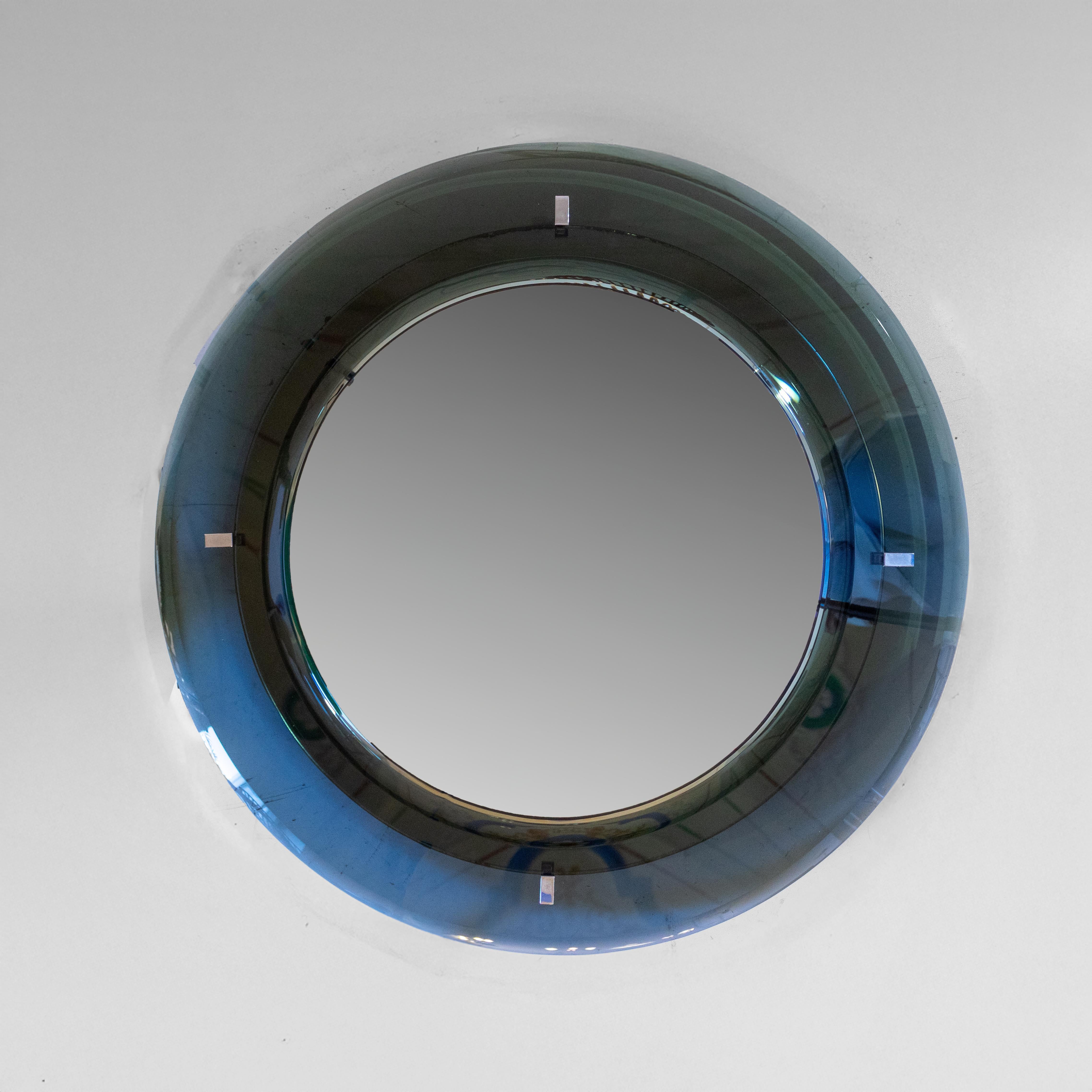 Mid-Century Modern Beveled Round Wall Mirror by Veca, Italy, 1970s

This elegant round wall mirror was crafted in Italy by the renowned glassmaker Veca during the 1970s, the design embodies the refined aesthetics of Mid-Century Modern Italian