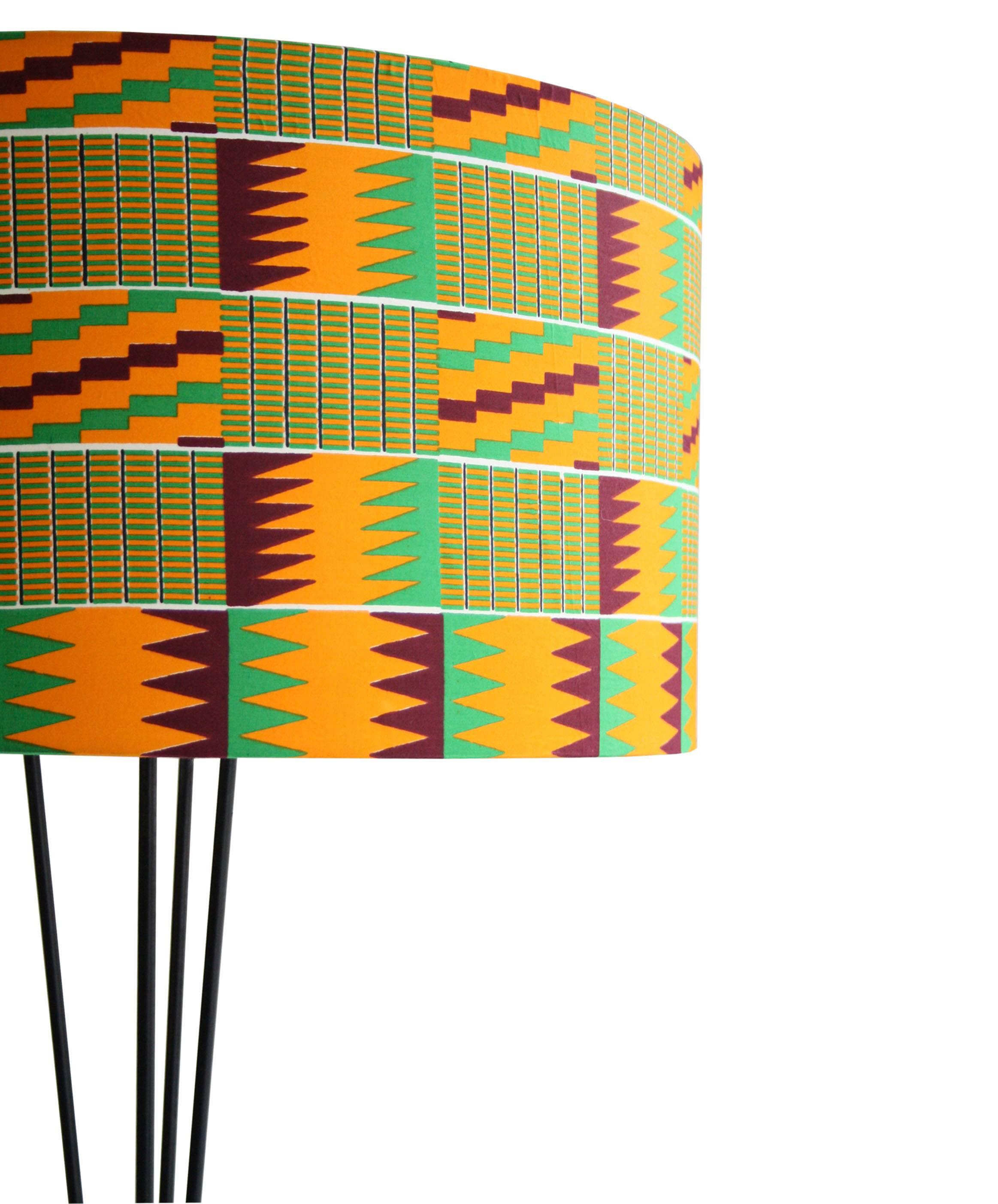 Floor lamp with black lacquered metallic structure with kenyan kitenge upholstered lamp shade.
 